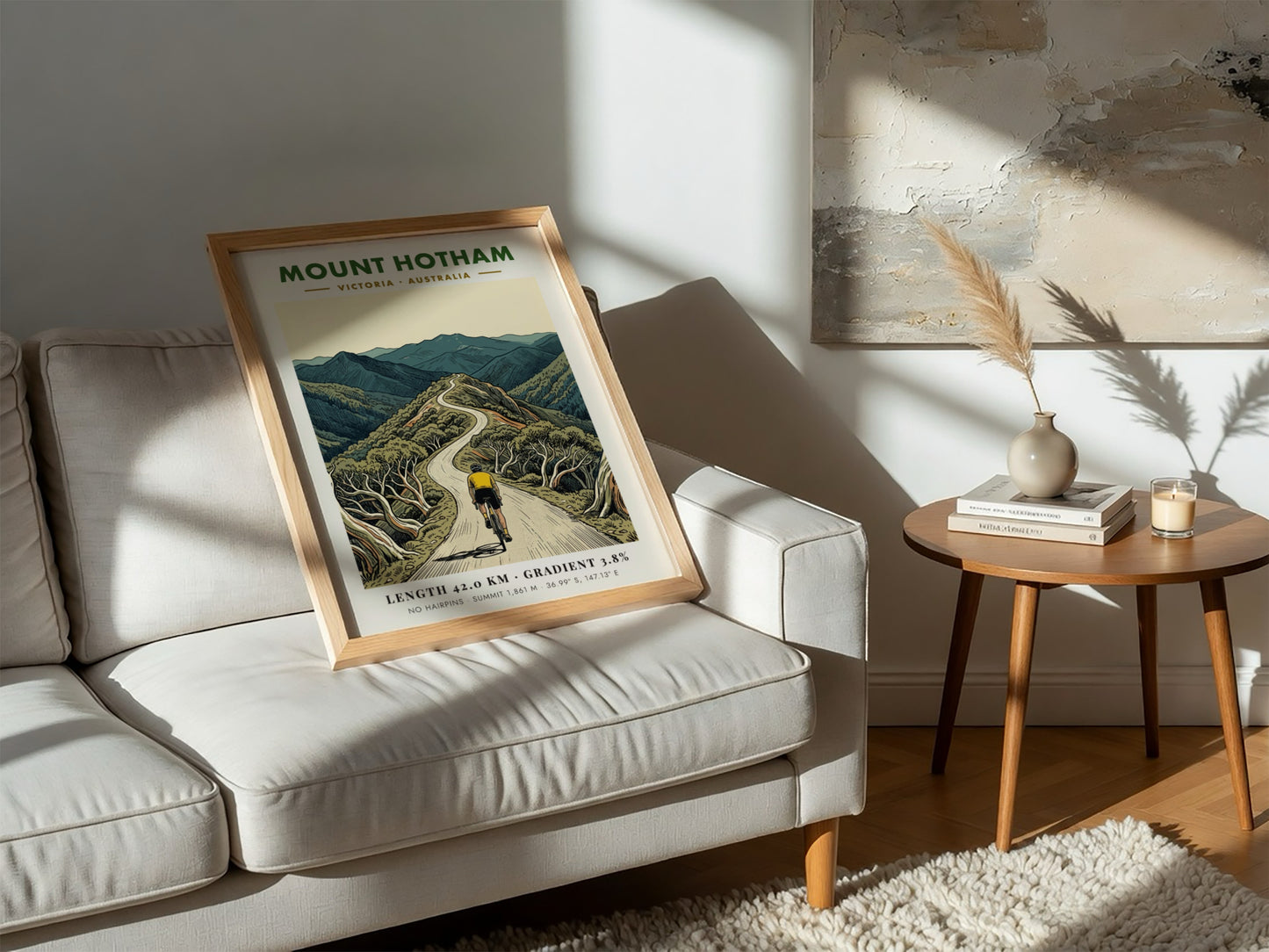 Poster of a cyclist riding up the winding Mount Hotham road in Victoria.