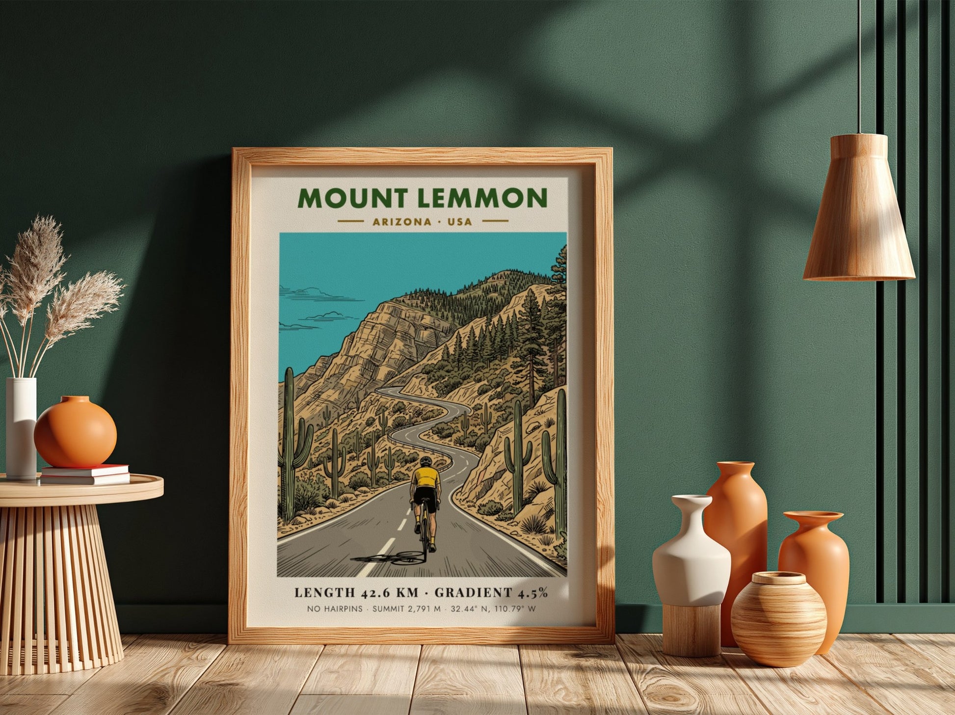 Poster of a cyclist climbing the winding Mount Lemmon road in Arizona with cacti.