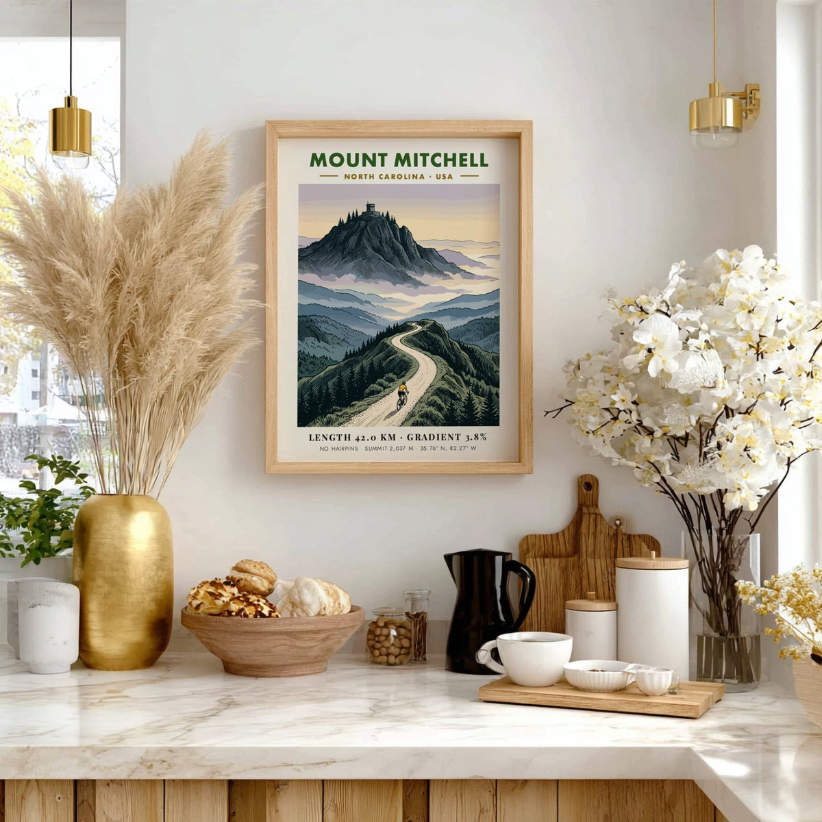 Poster of a cyclist climbing Mount Mitchell with a mountain observatory in the background.