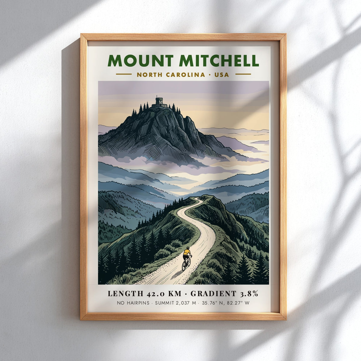 Poster of a cyclist climbing Mount Mitchell with a mountain observatory in the background.