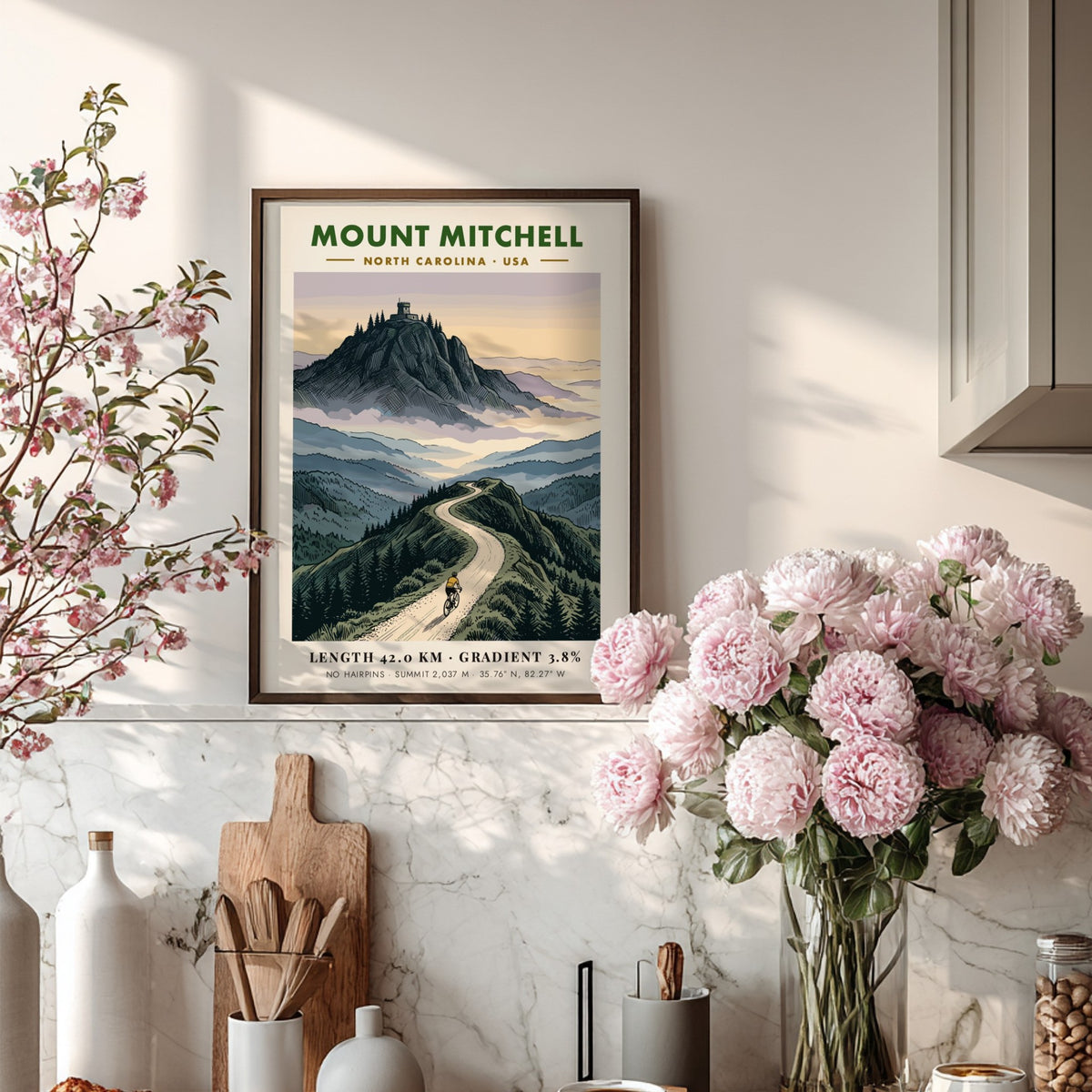 Poster of a cyclist climbing Mount Mitchell with a mountain observatory in the background.