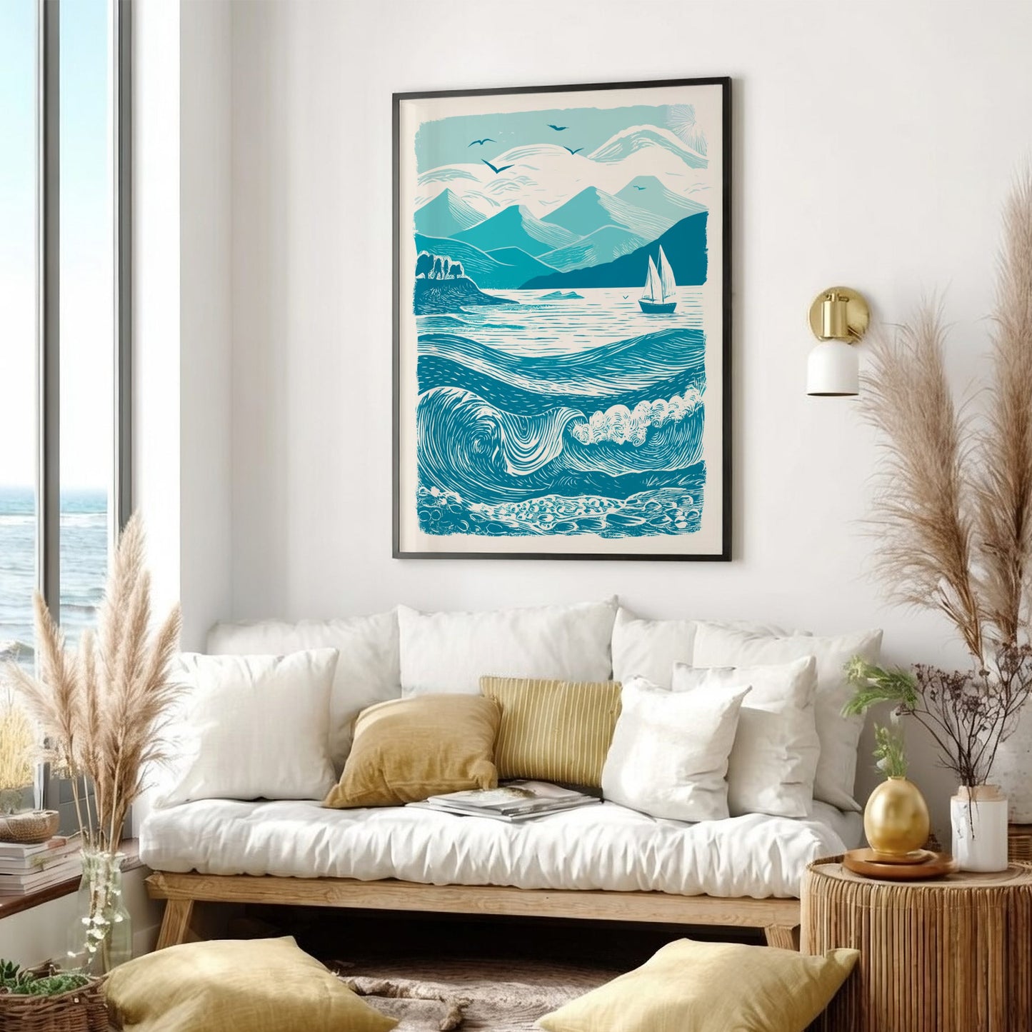 Living room with a white sofa, decorative pillows, and a framed ocean art print on the wall.