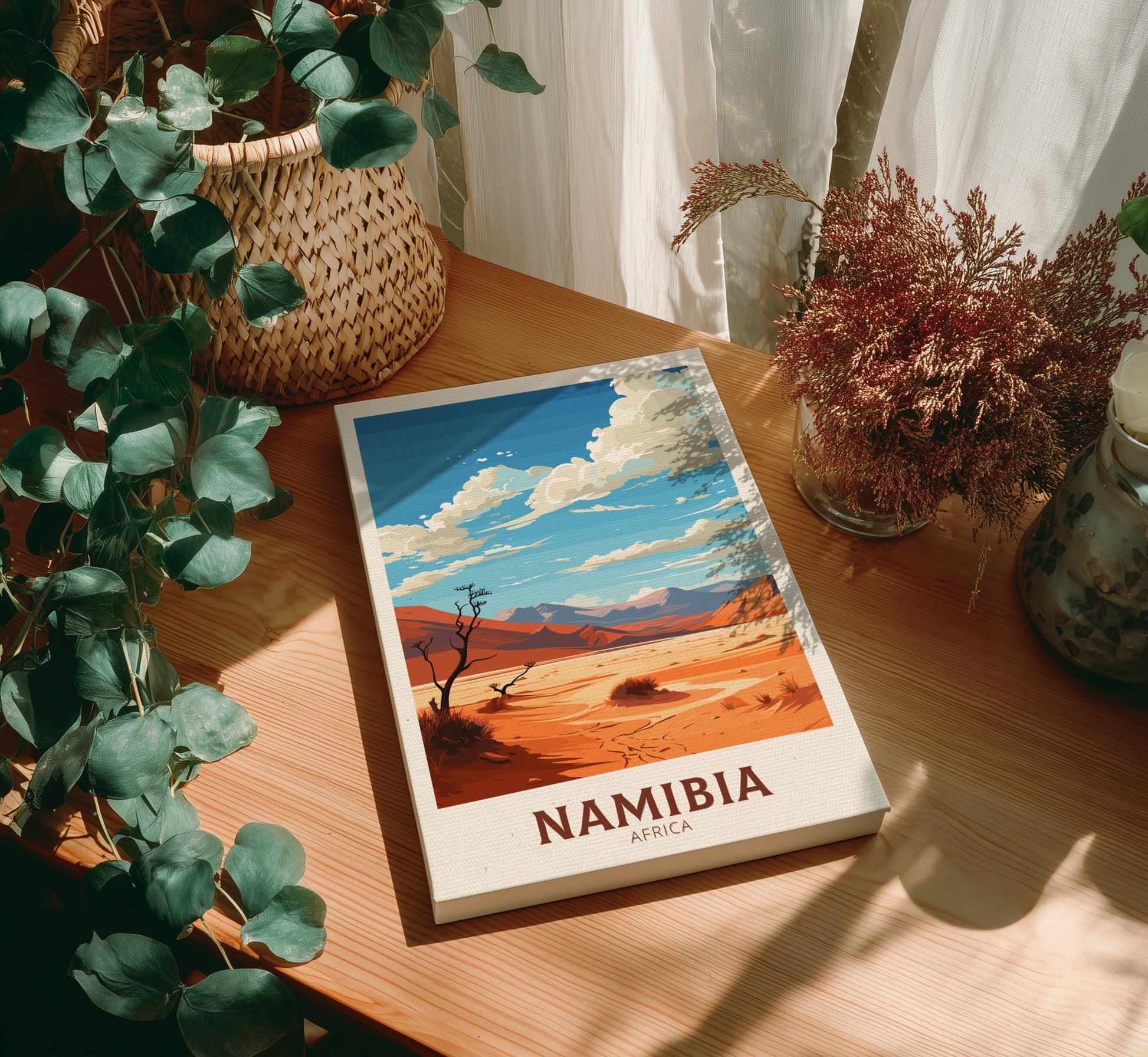 Canvas 'Namibia' on a wooden surface with plants around