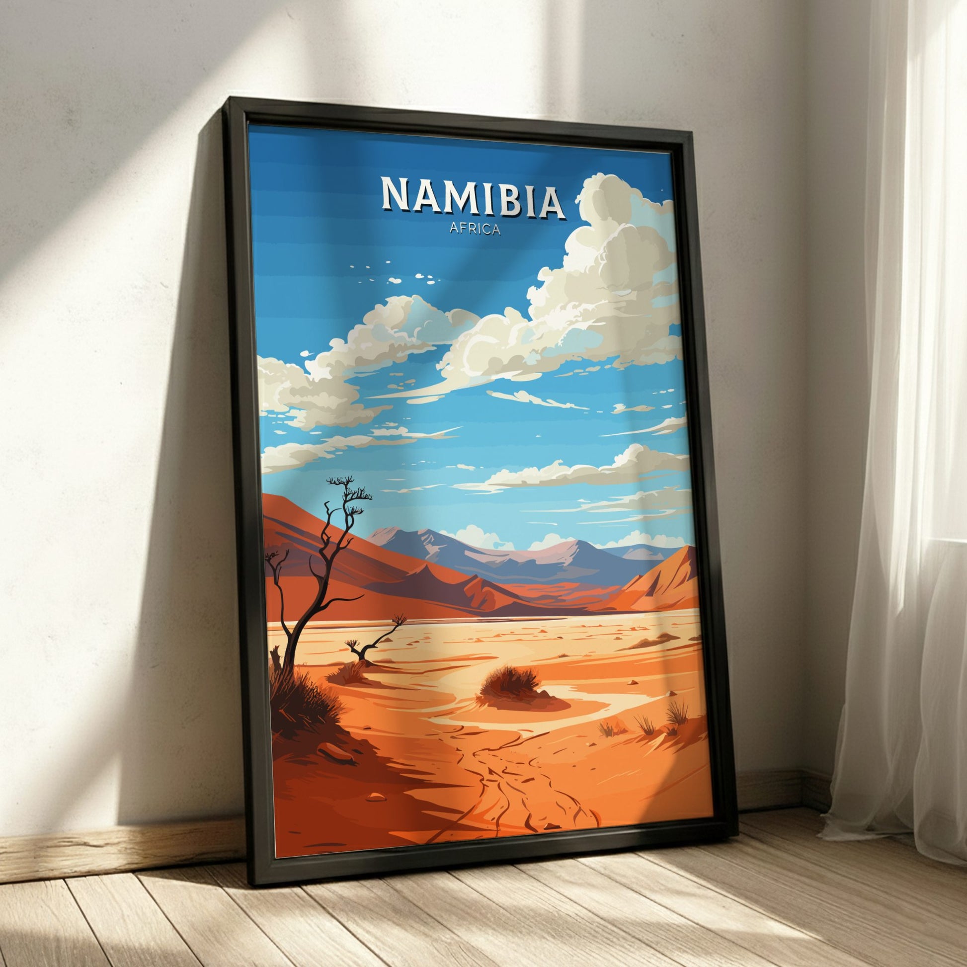 Framed poster of Namibia with desert landscape and blue sky.