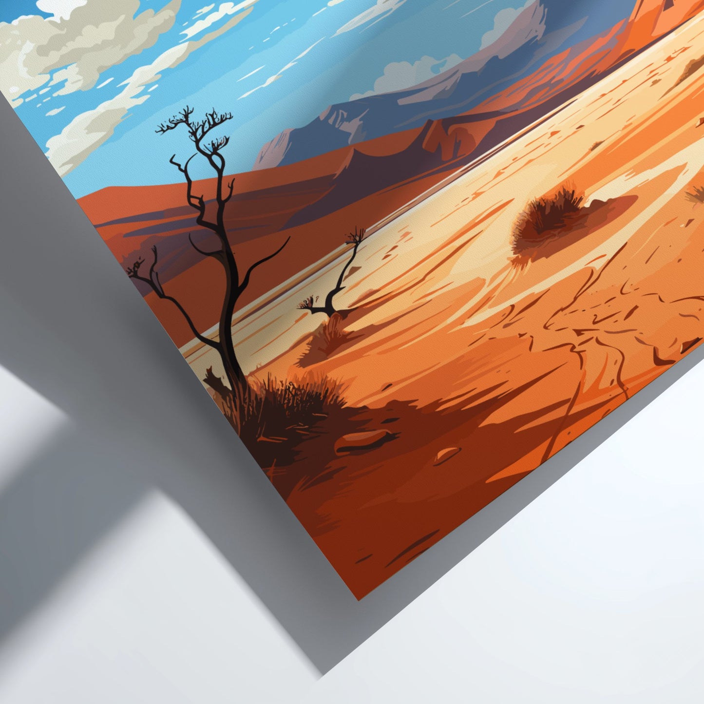 Desert landscape with orange sand, blue sky, and white clouds.