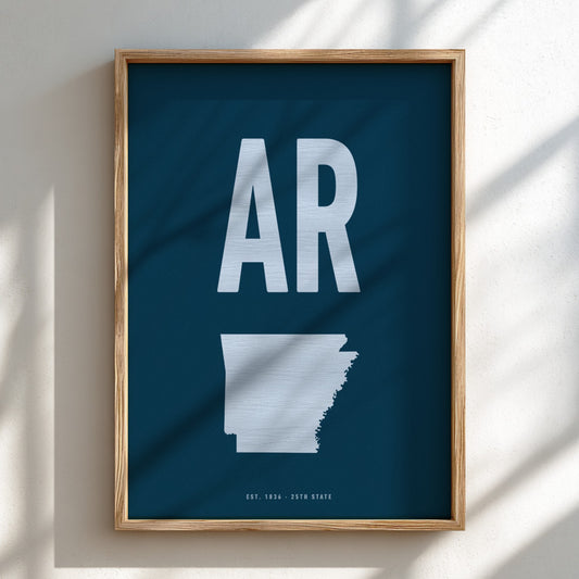 Framed poster with 'AR' and outline of Arkansas on a blue background