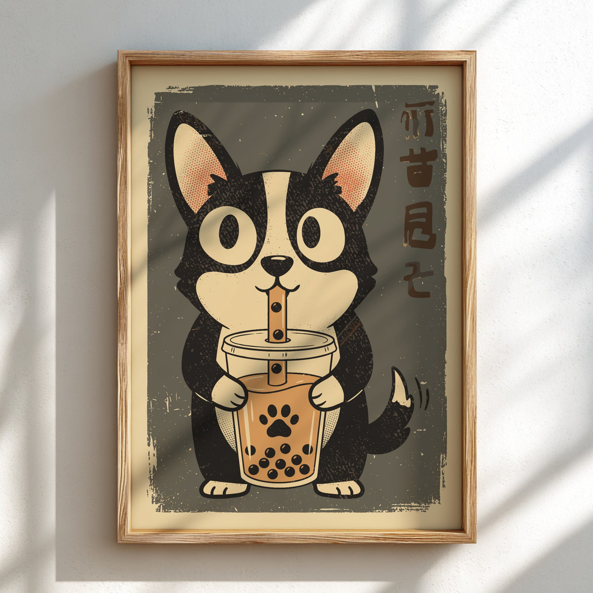 A framed art print featuring a cute cartoon dog holding a bubble tea cup, displayed on a light wall with soft diagonal shadows.