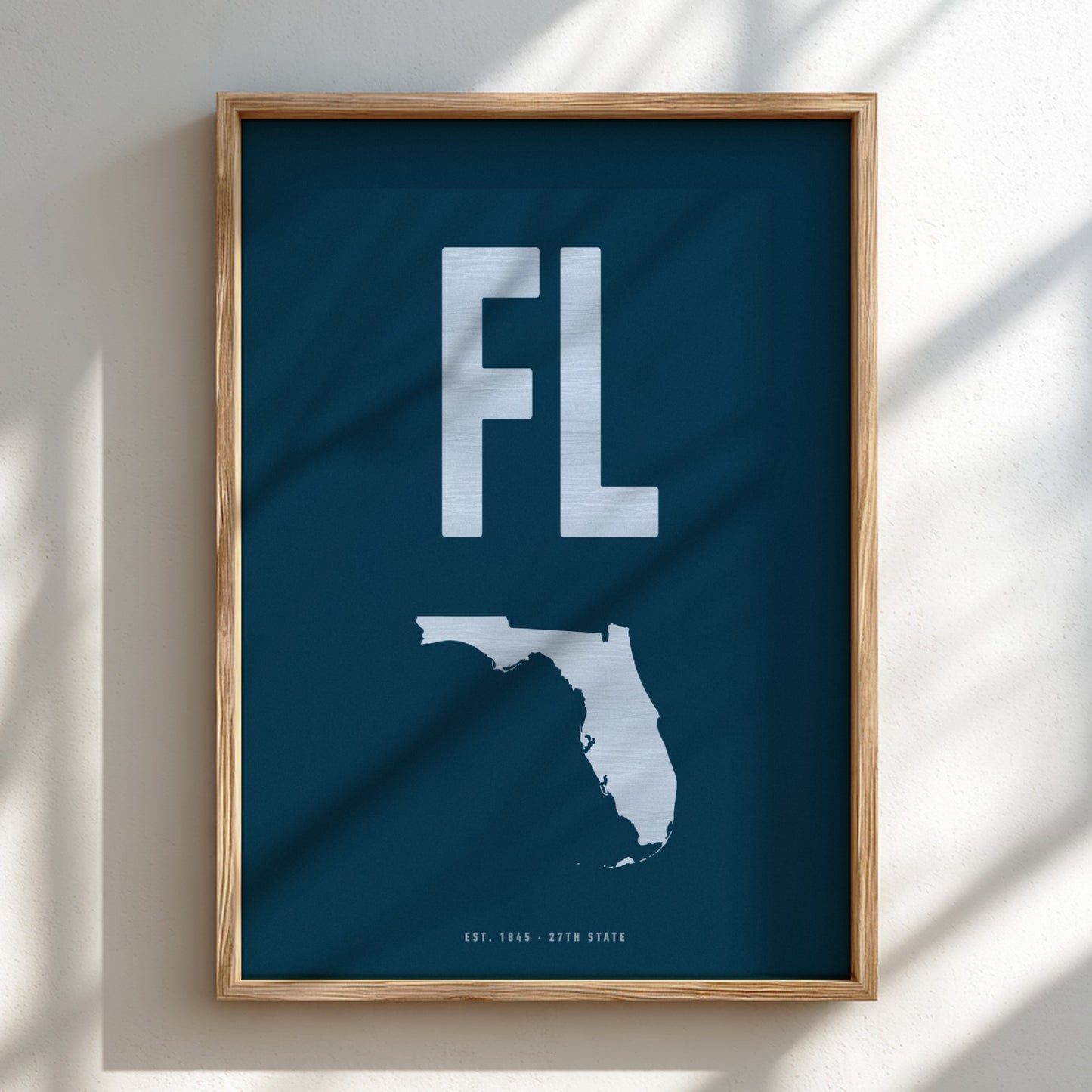 Framed poster with 'FL' and map of Florida on a blue background
