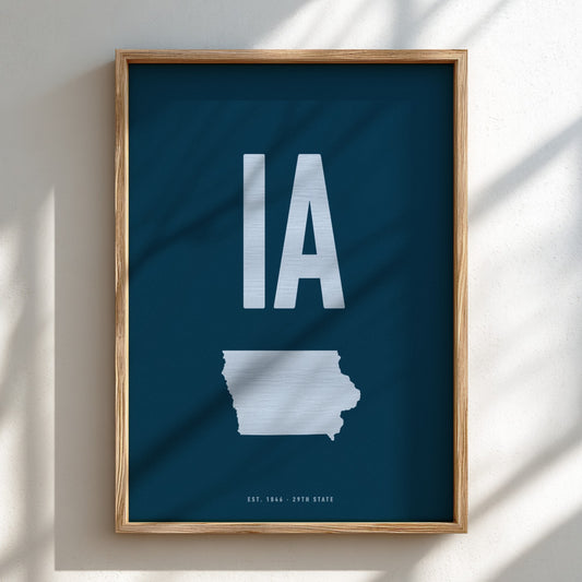 Framed poster of Iowa with 'IA' on a blue background