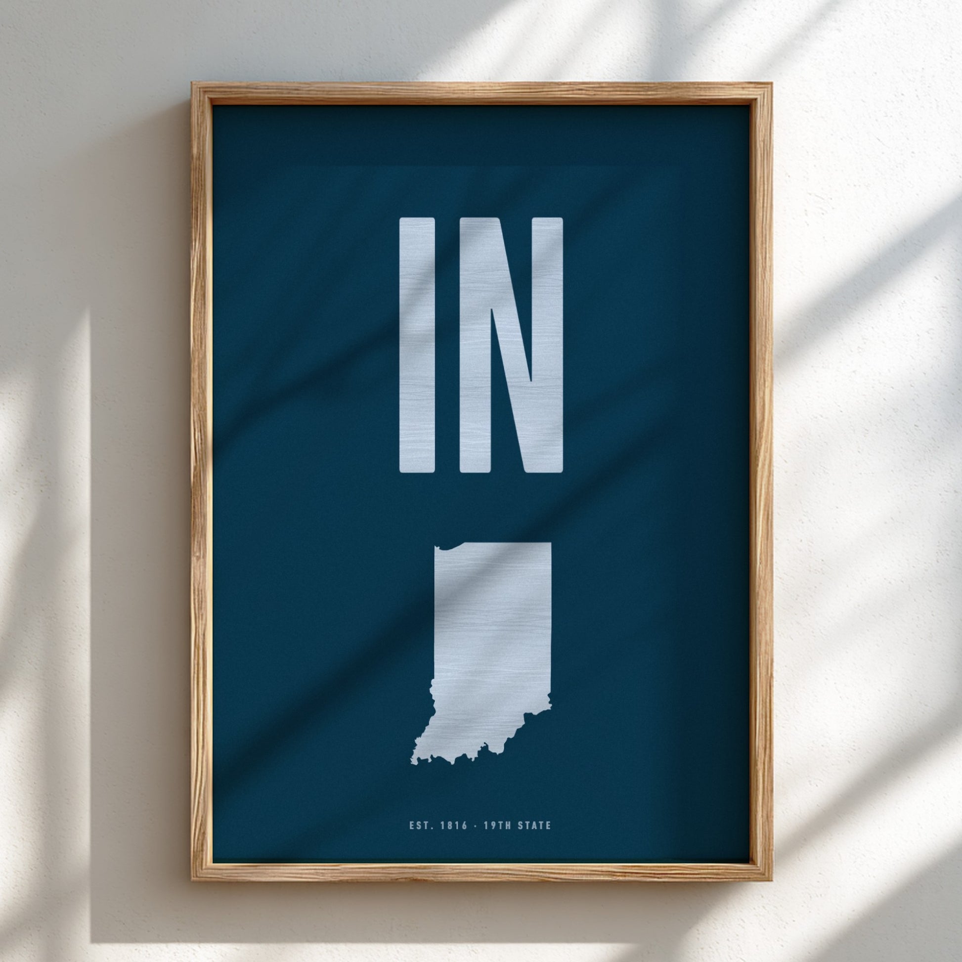 Framed poster of Indiana with 'IN' on a blue background