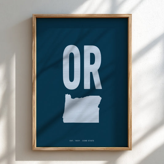 Framed poster with 'OR' and outline of Oregon on a blue background