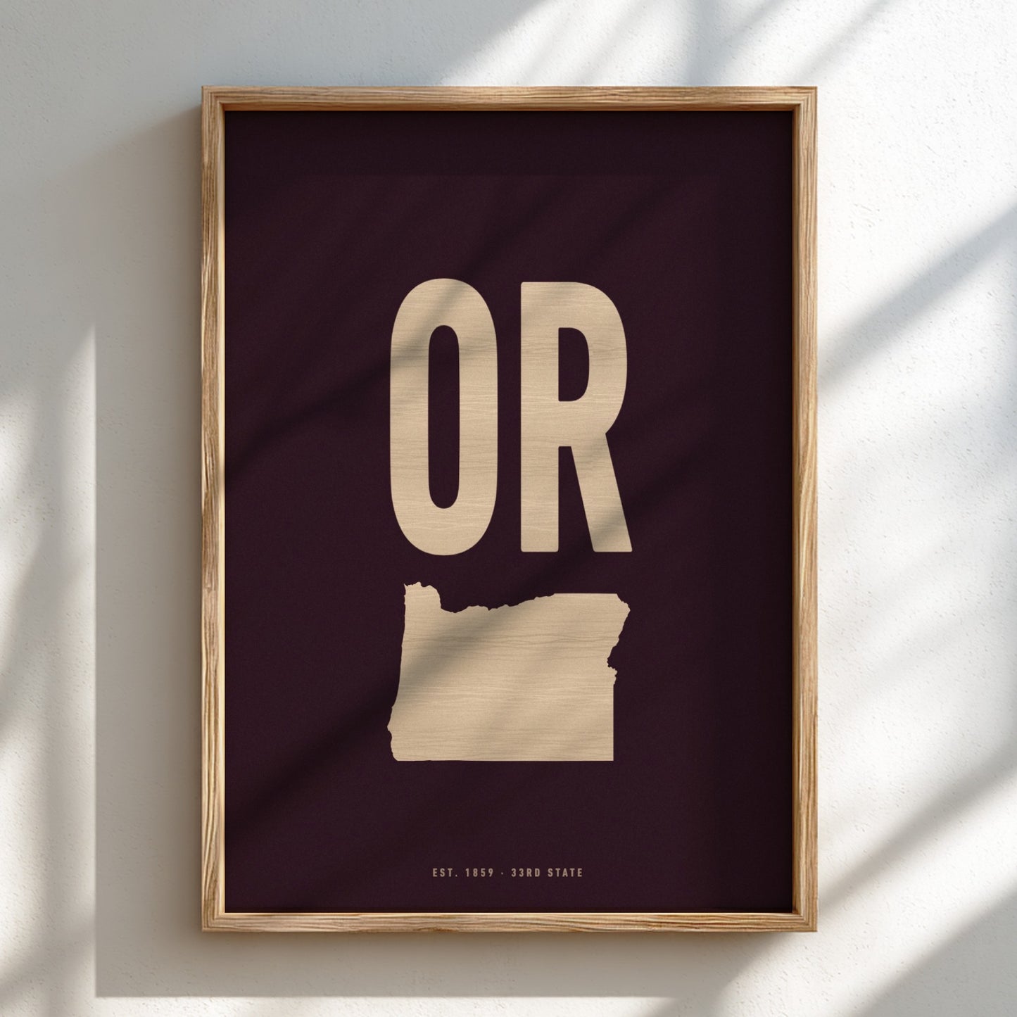 Framed artwork with 'OR' on a dark background