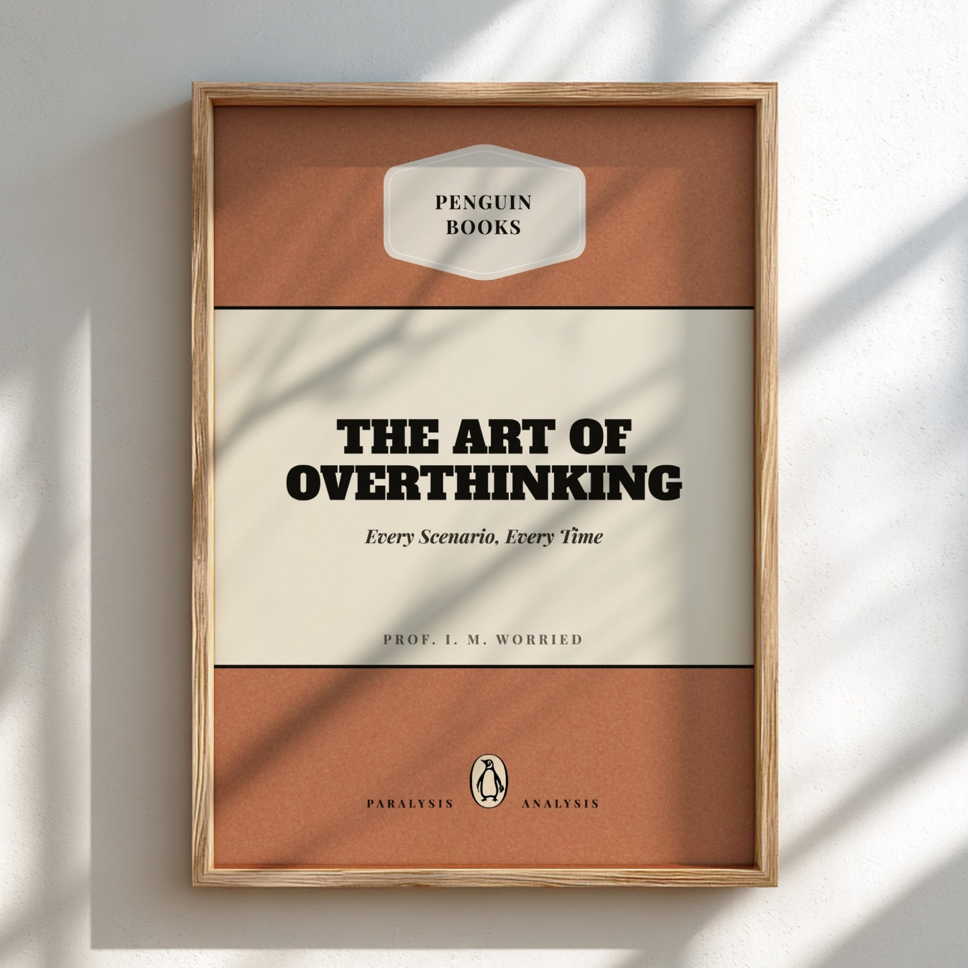 Framed book cover of 'The Art of Overthinking' by Penguin Books on a light background