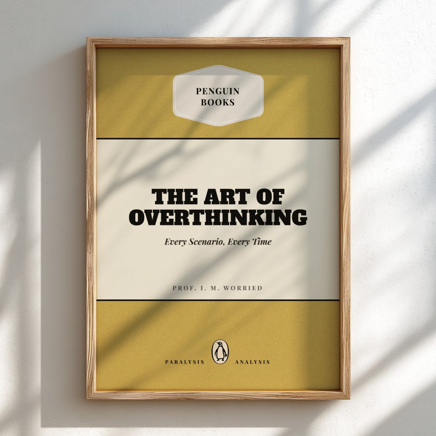 Framed book cover of 'The Art of Overthinking' by Penguin Books on a light background