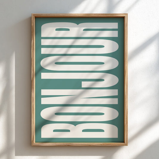 Framed artwork with 'BONJOUR' text on a teal background