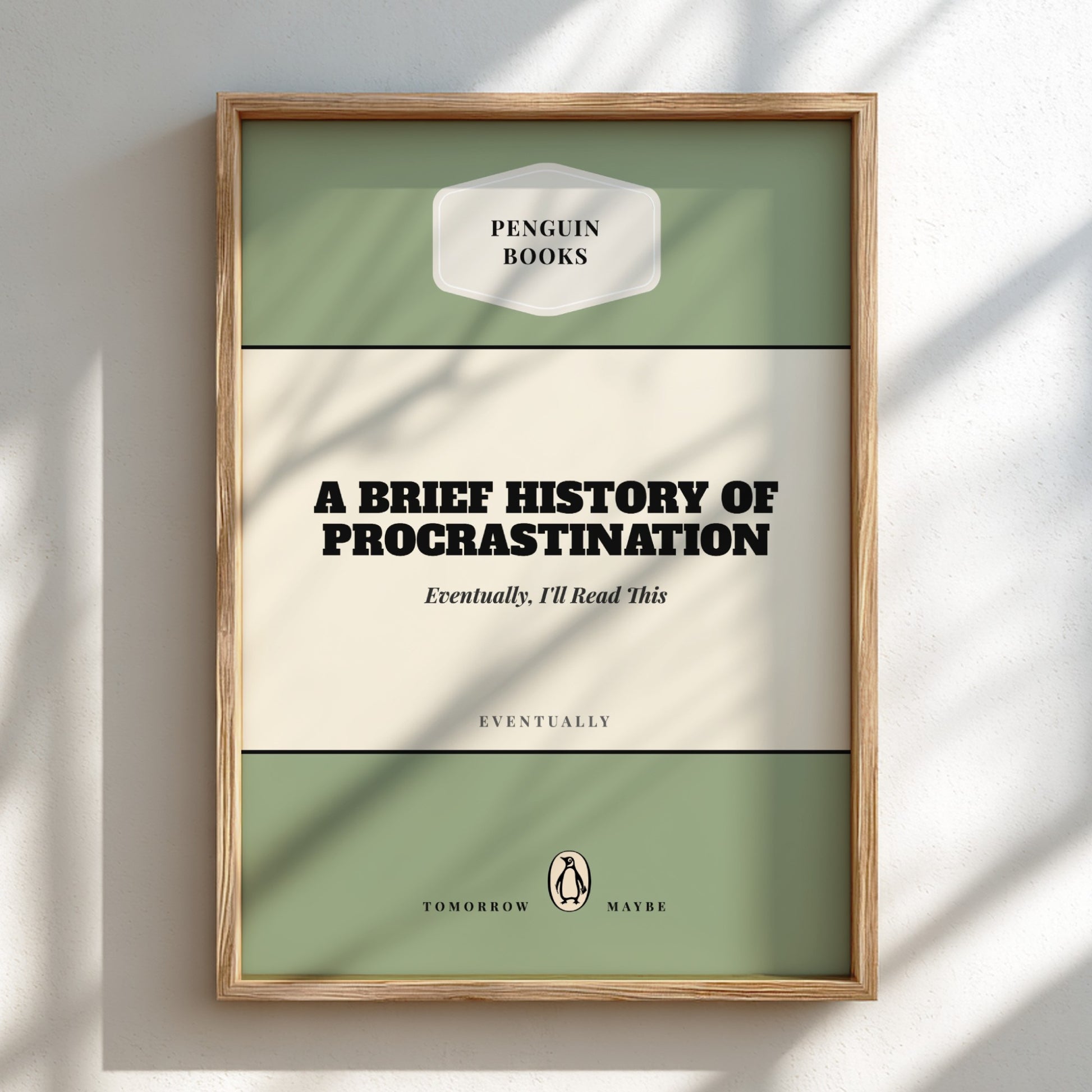 Framed book cover of 'A Brief History of Procrastination' by Penguin Books on a light background.