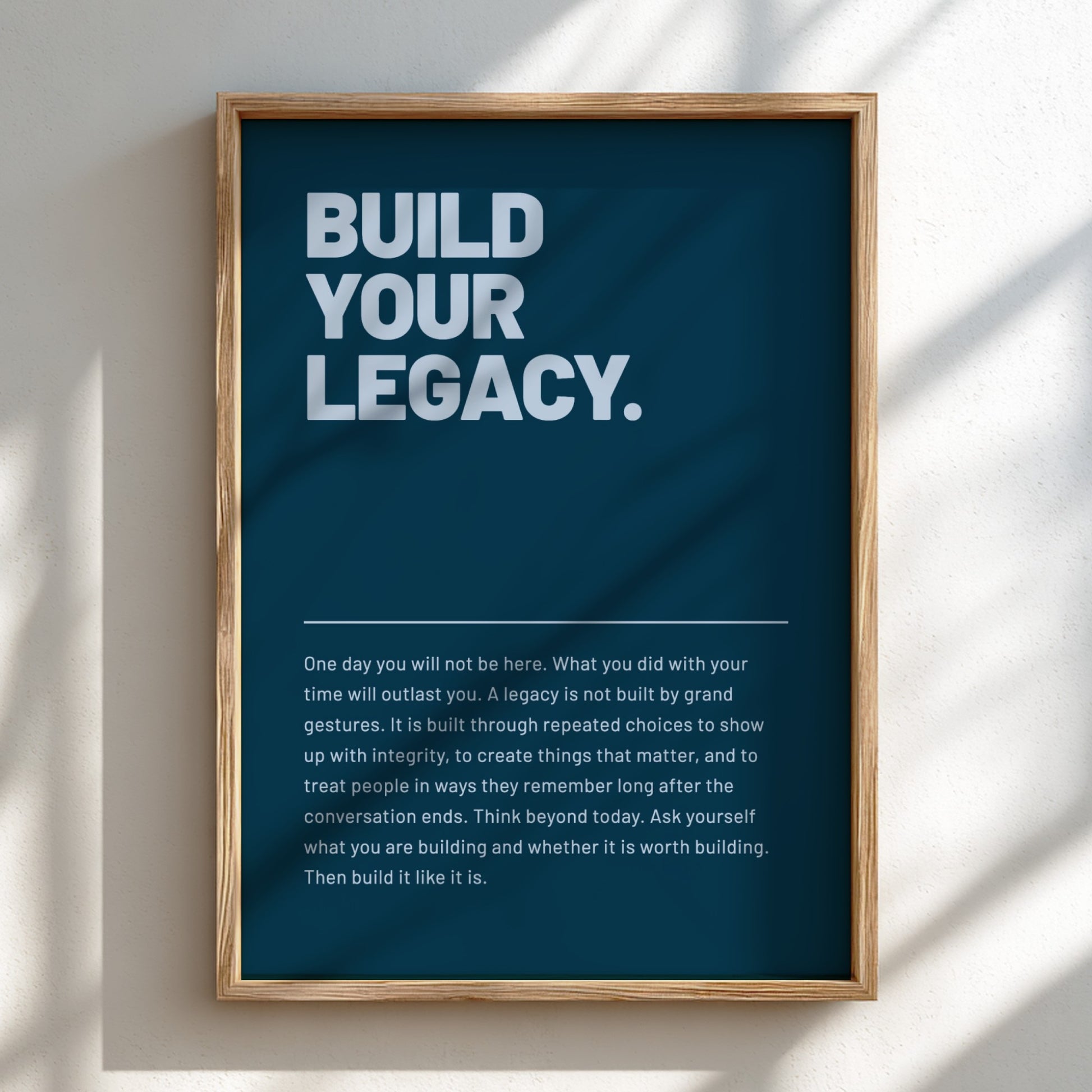 Framed poster with motivational text on a blue background