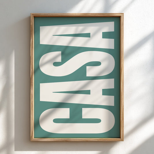 Framed artwork with 'CASA' text on a teal background