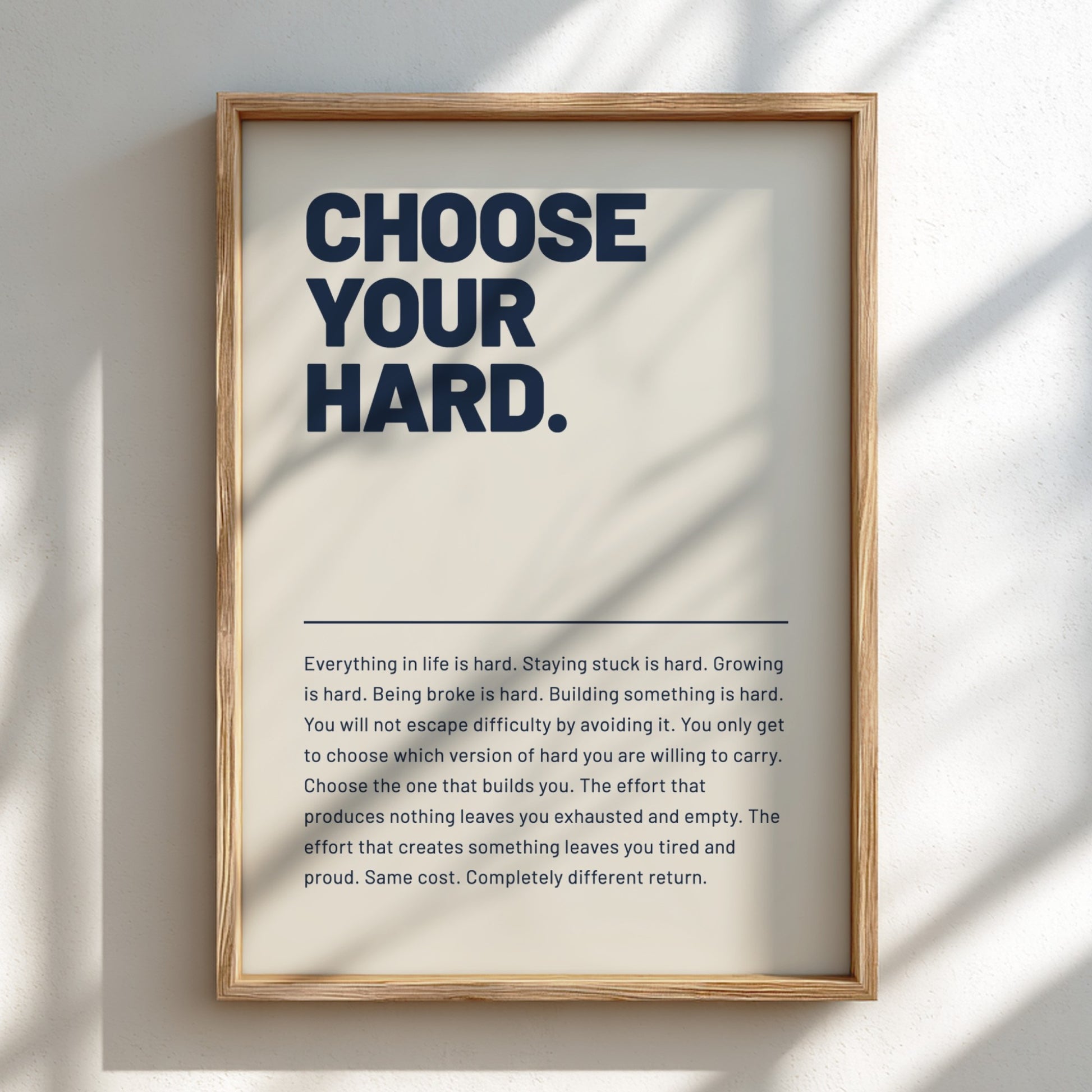 Framed motivational poster with text on a light background