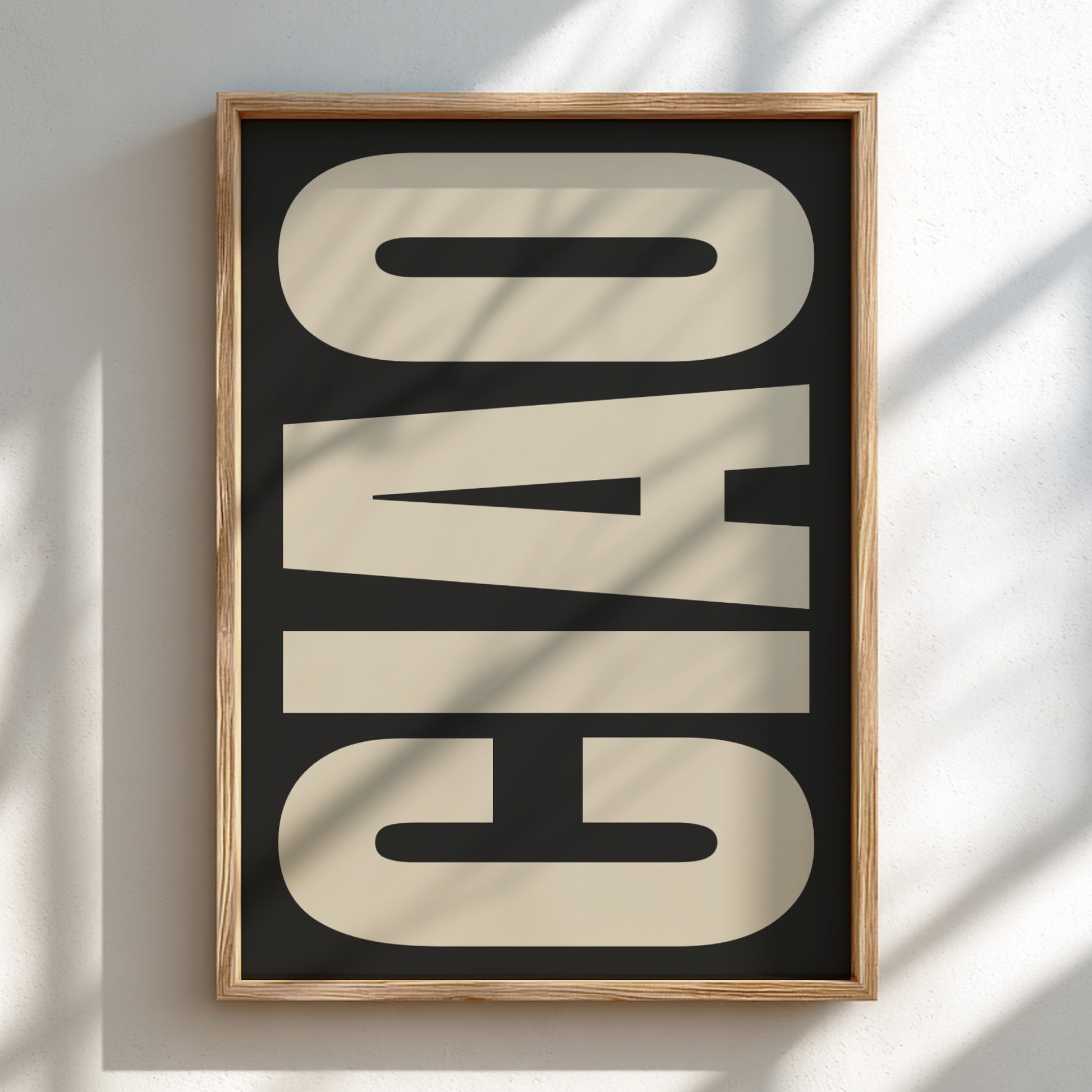 Framed artwork with 'CIAO' in beige on a black background