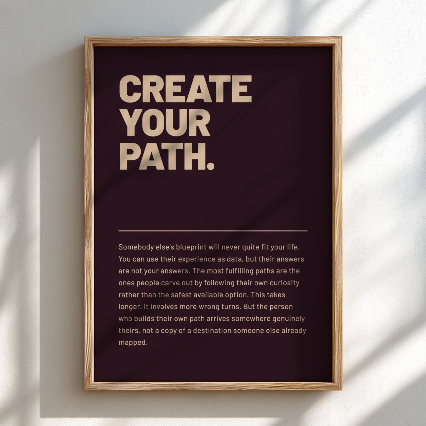 Framed poster with motivational text on a dark background