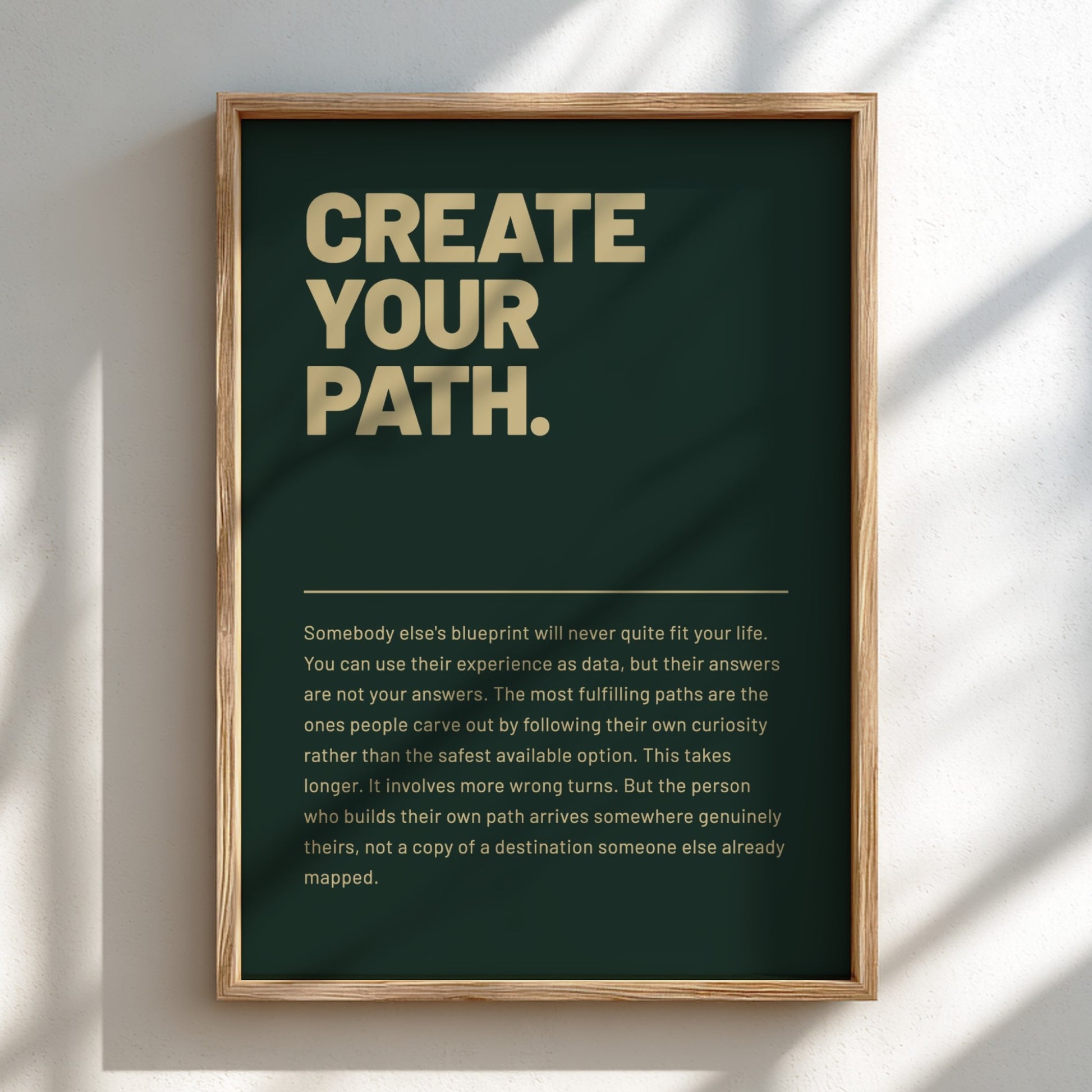 Framed poster with motivational text on a dark green background