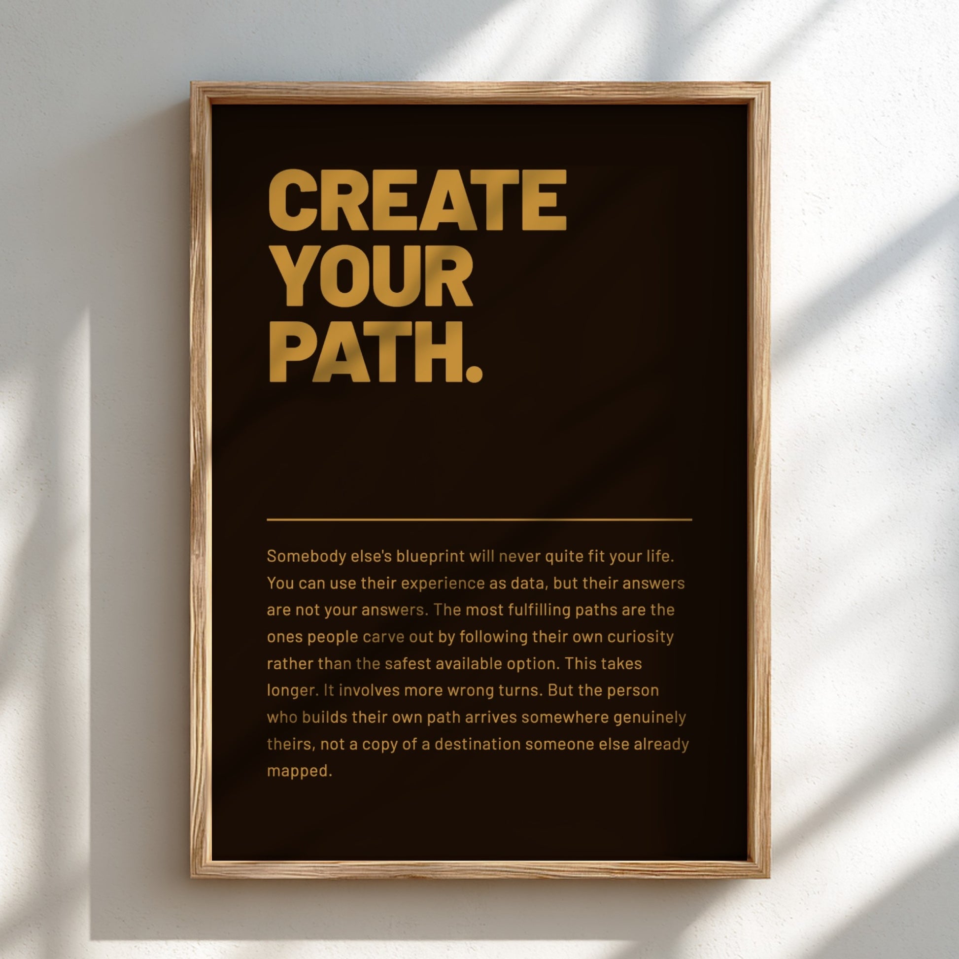 Framed poster with motivational text on a black background