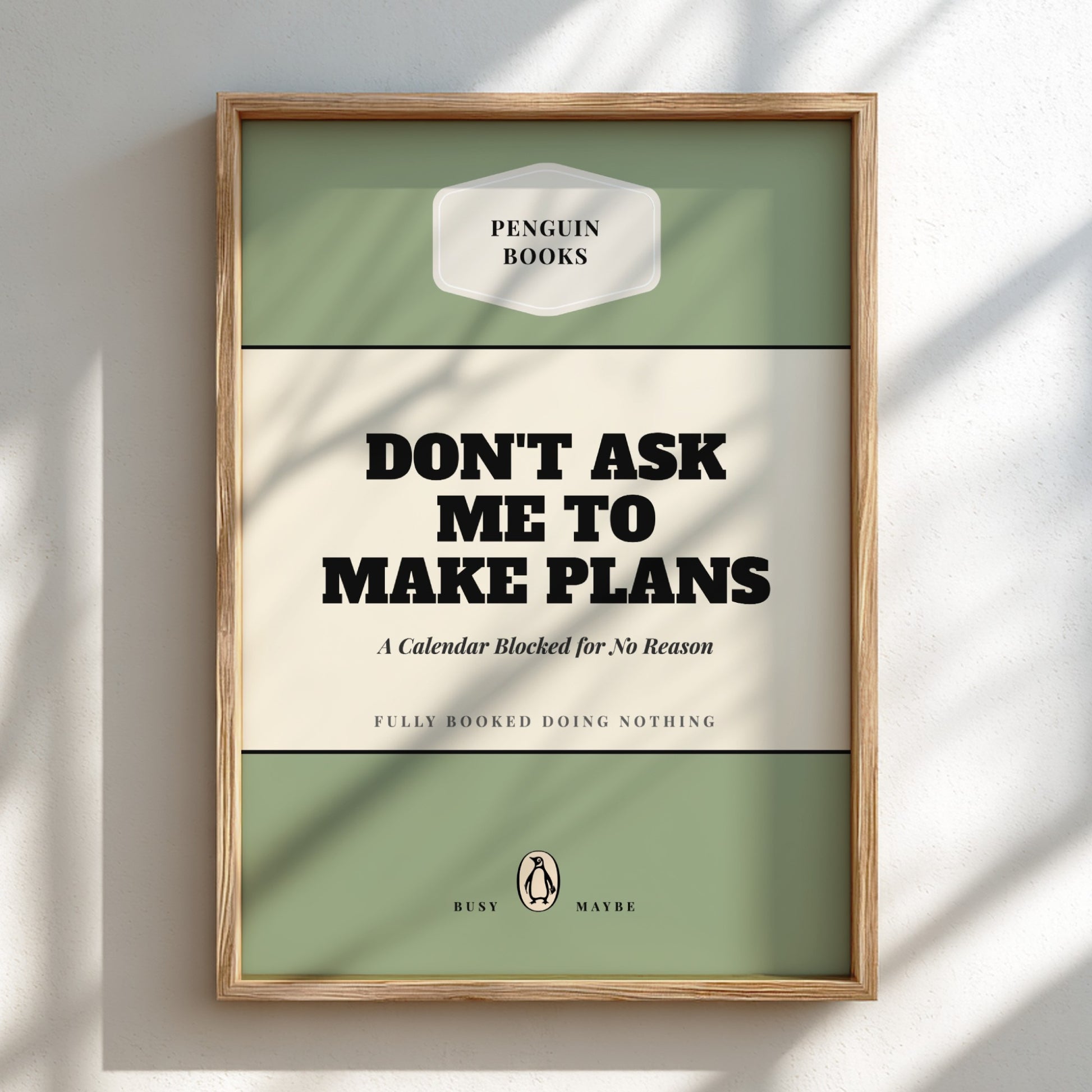 Framed poster with 'Penguin Books' design and text 'Don't ask me to make plans'.