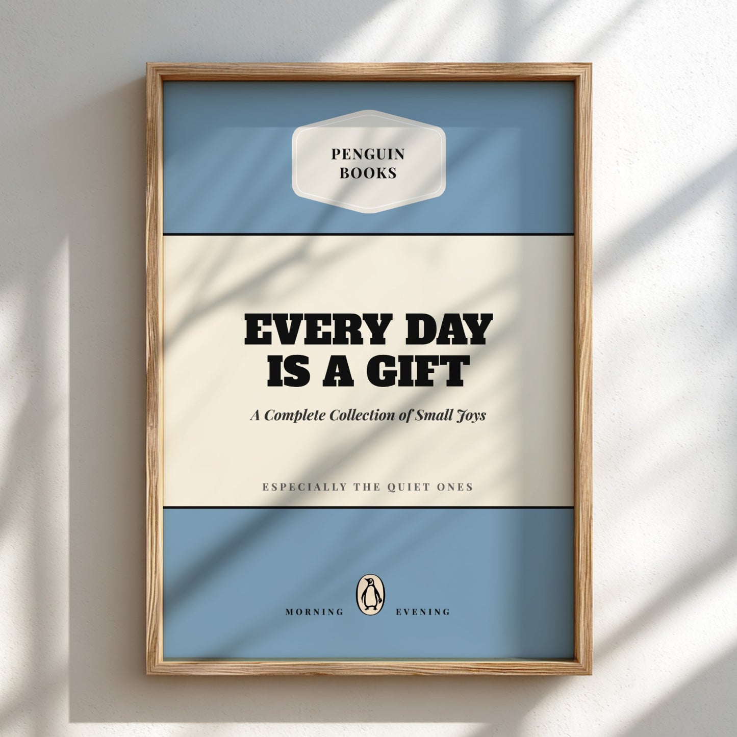 Framed Penguin Books poster with 'Every Day is a Gift' quote on a light background