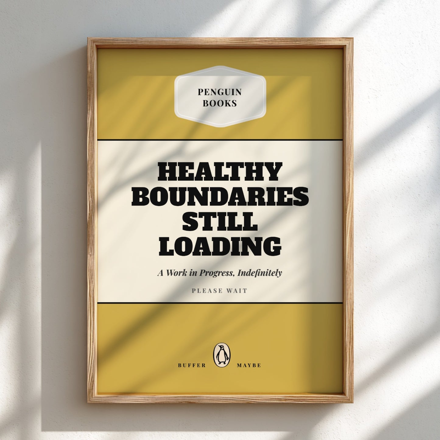 Framed poster with 'Penguin Books' design and text 'Healthy Boundaries Still Loading'.