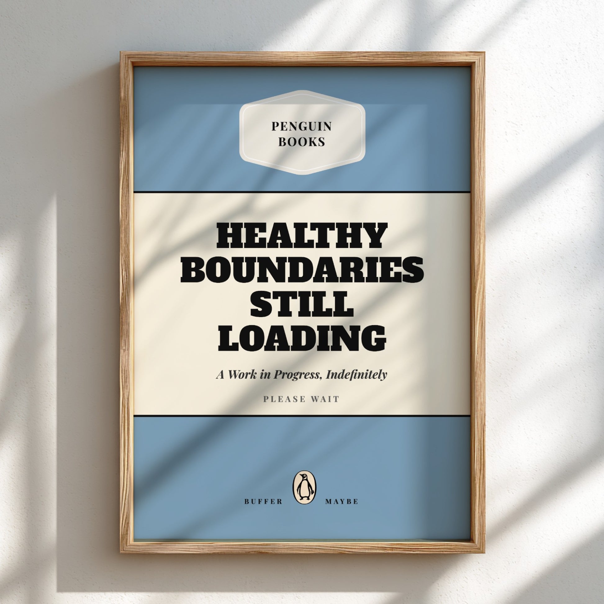 Framed poster with 'Penguin Books' design and text 'Healthy Boundaries Still Loading'.
