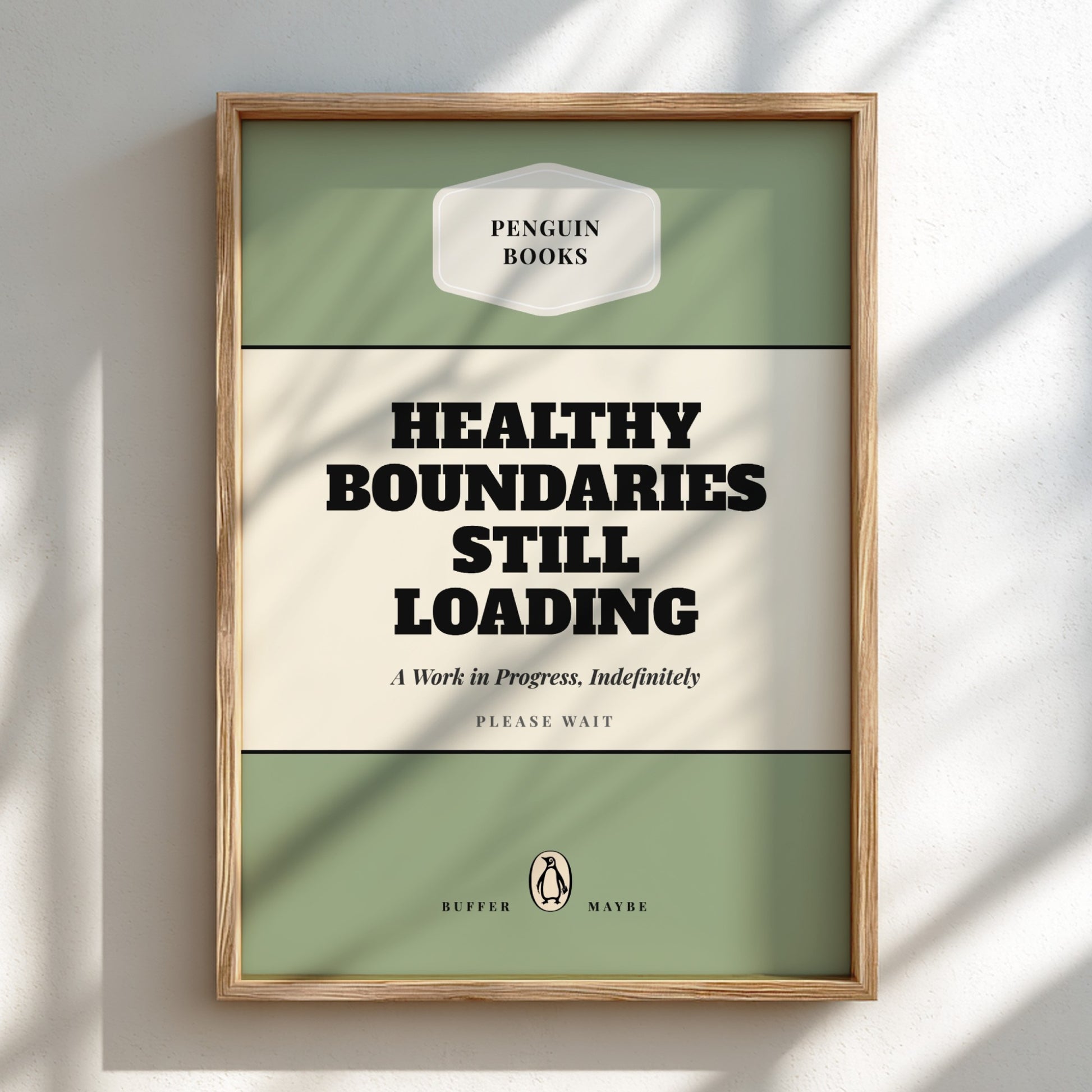 Framed poster with 'Penguin Books' design and text 'Healthy Boundaries Still Loading'.