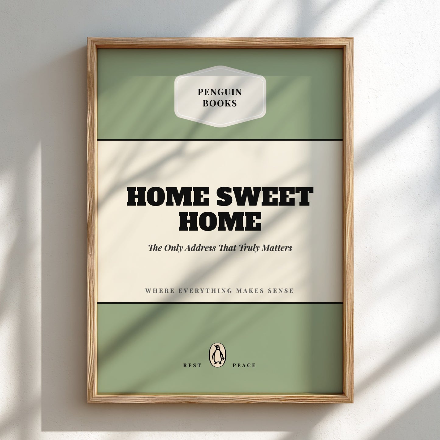Framed Penguin Books 'Home Sweet Home' book cover on a light background