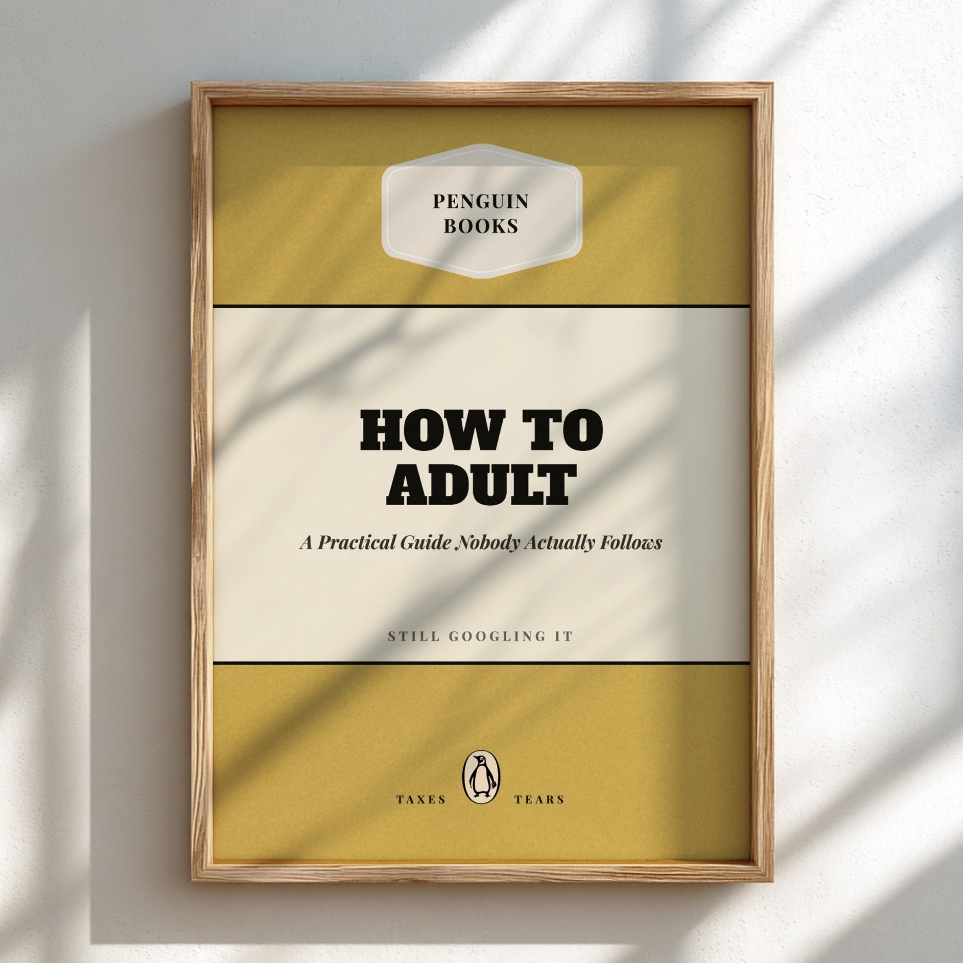 Framed book cover of 'How to Adult' by Penguin Books on a light background