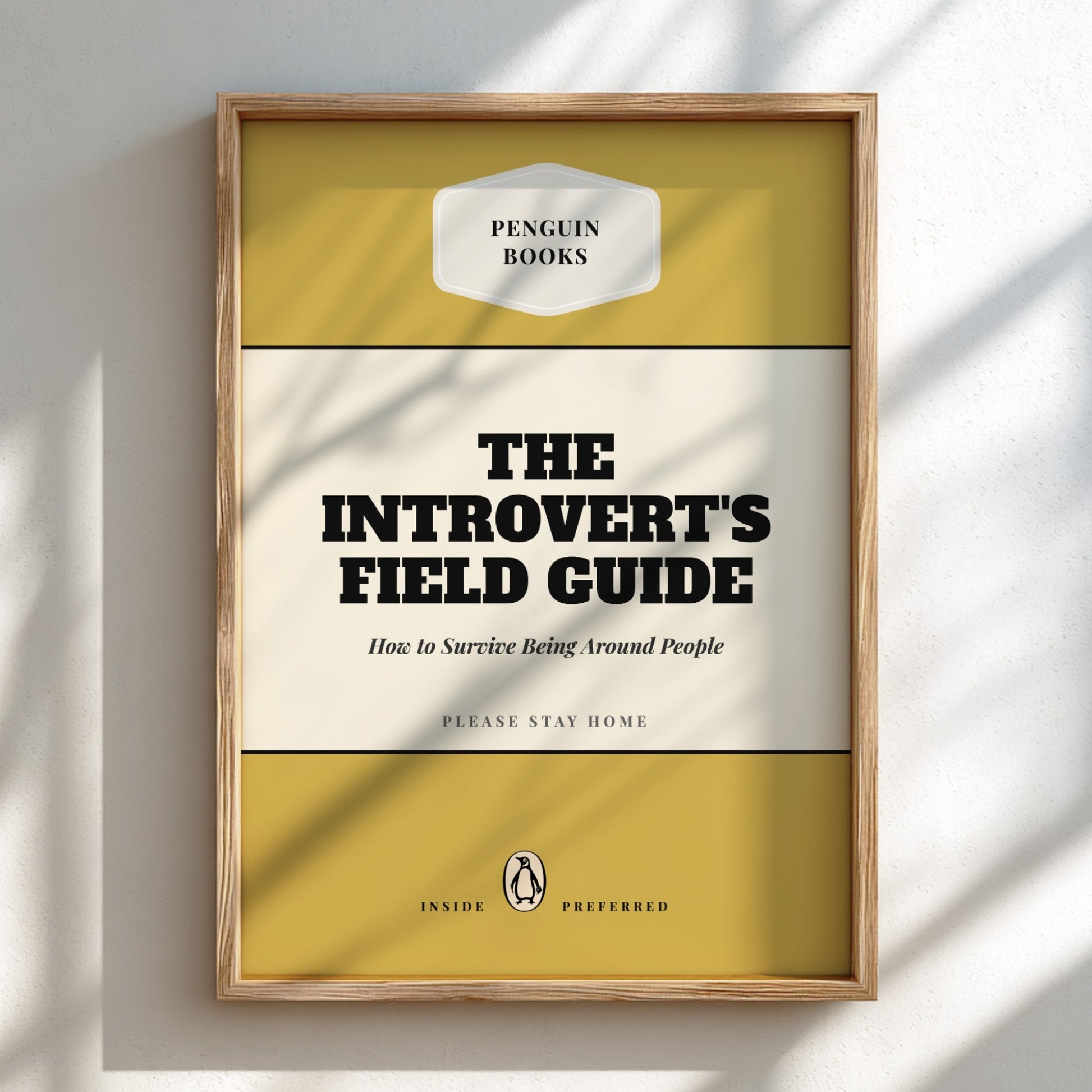 Framed book cover of 'The Introvert's Field Guide' by Penguin Books on a light background