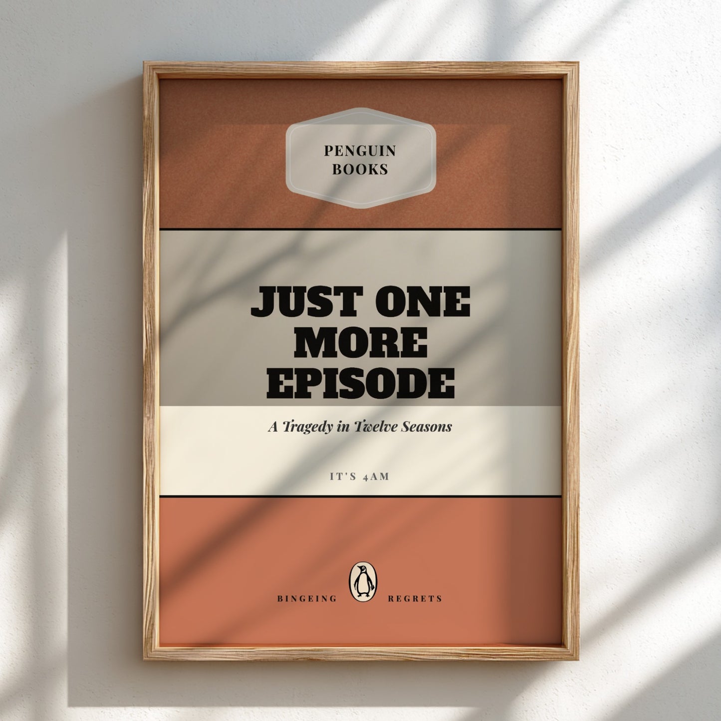 Framed book cover with 'Penguin Books' branding and text 'Just One More Episode'.