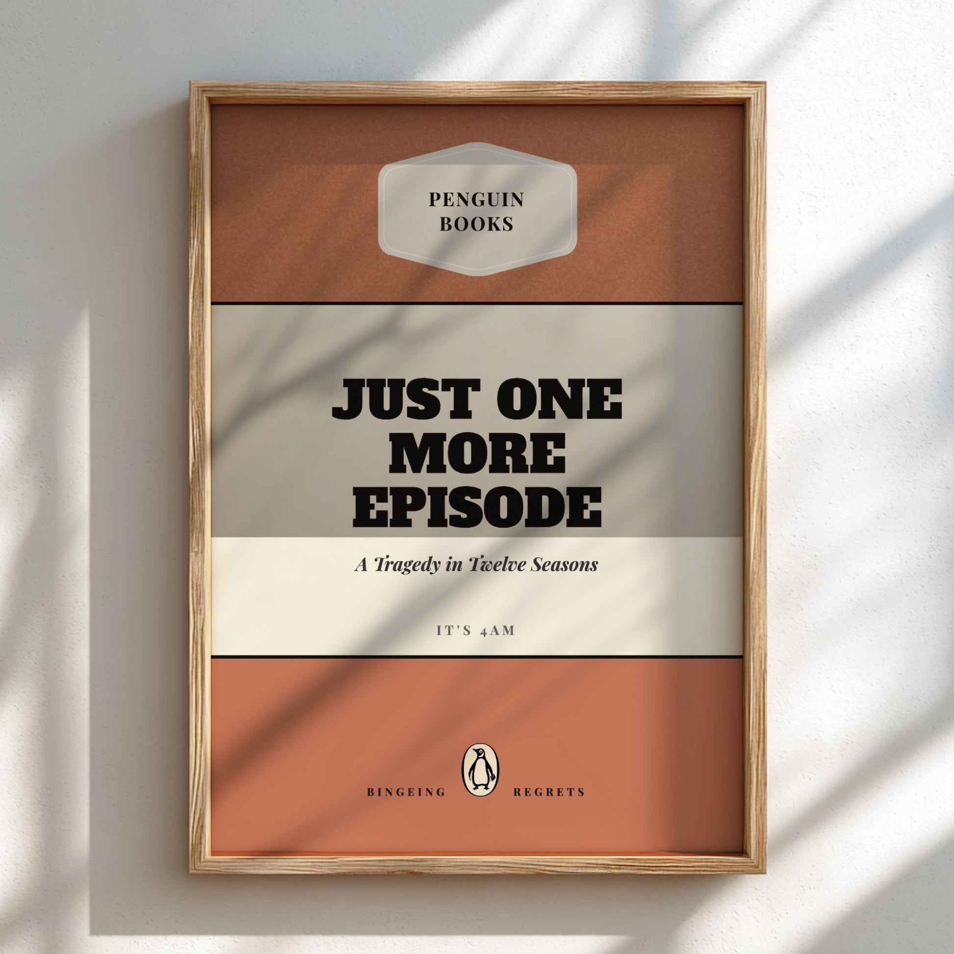 Framed book cover with 'Penguin Books' branding and text 'Just One More Episode'.