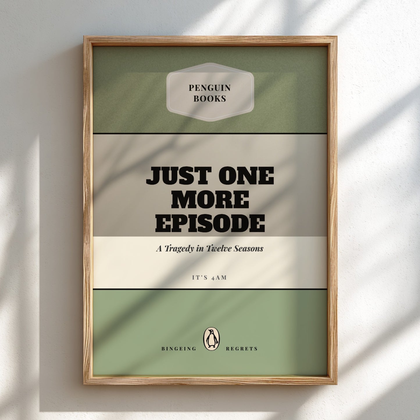 Framed book cover with 'Penguin Books' branding and text 'Just One More Episode'.