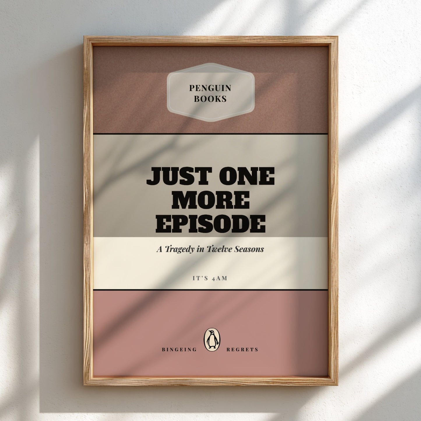 Framed book cover with 'Penguin Books' logo and text 'Just One More Episode'.