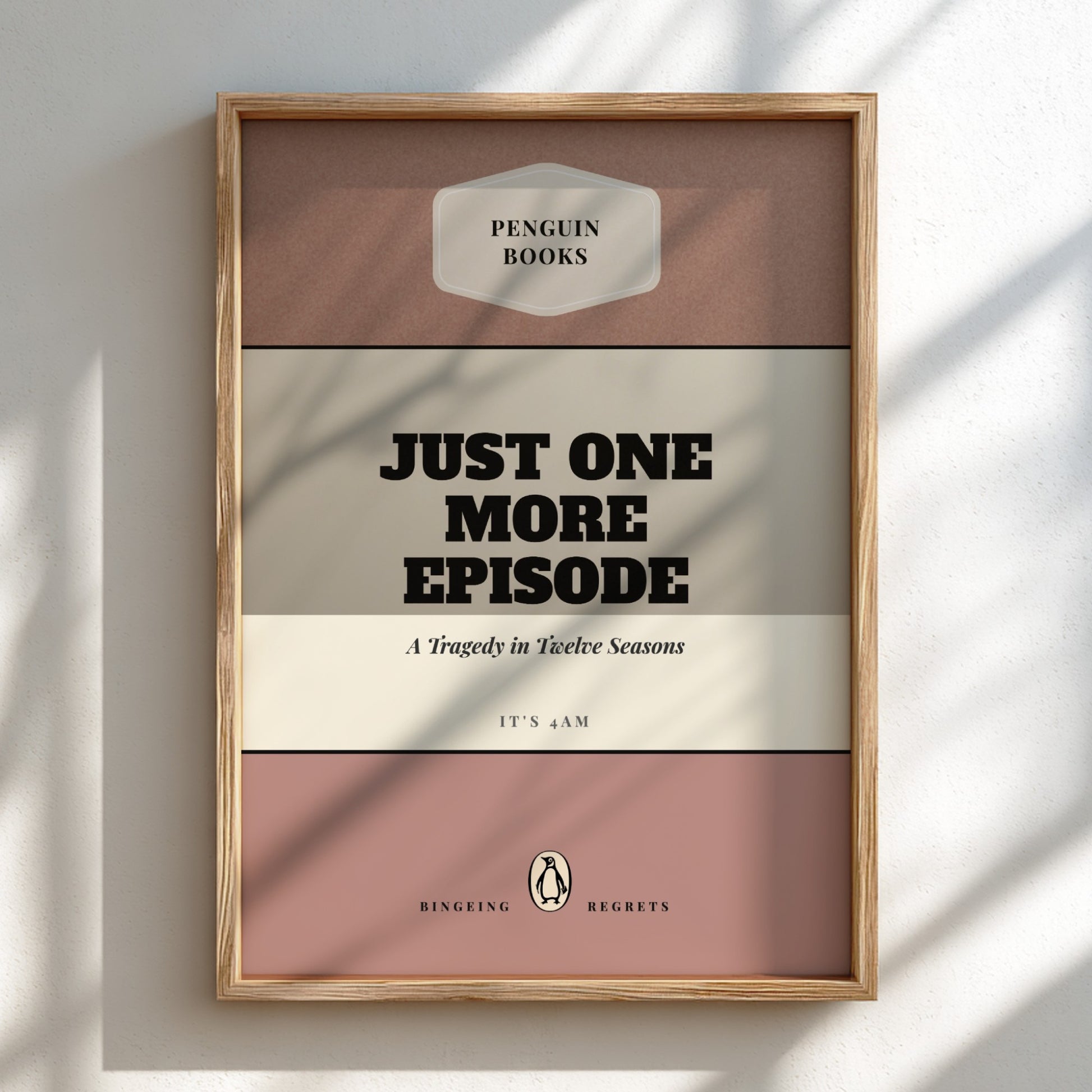Framed book cover with 'Penguin Books' logo and text 'Just One More Episode'.