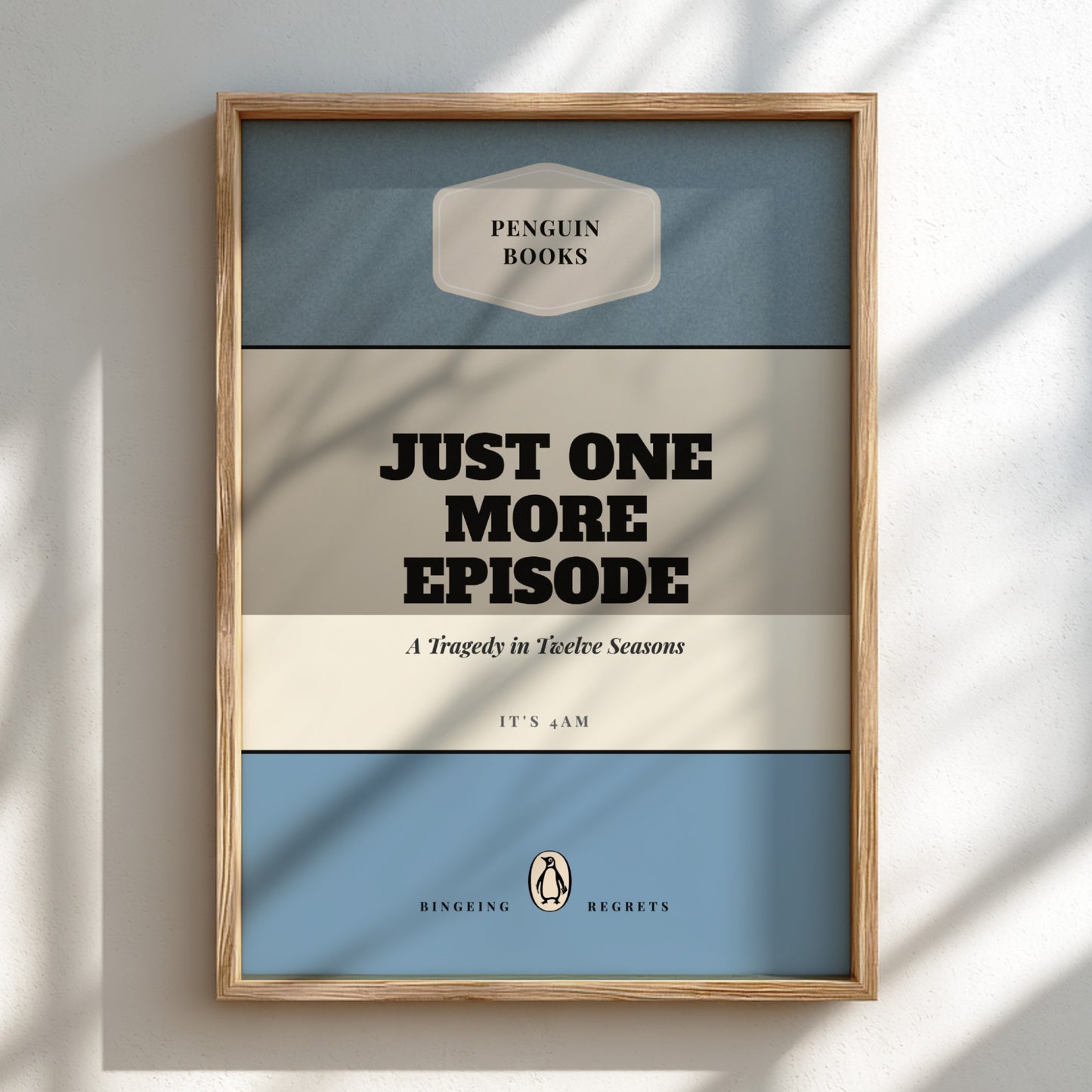 Framed book cover with 'Penguin Books' logo and text 'Just One More Episode'.