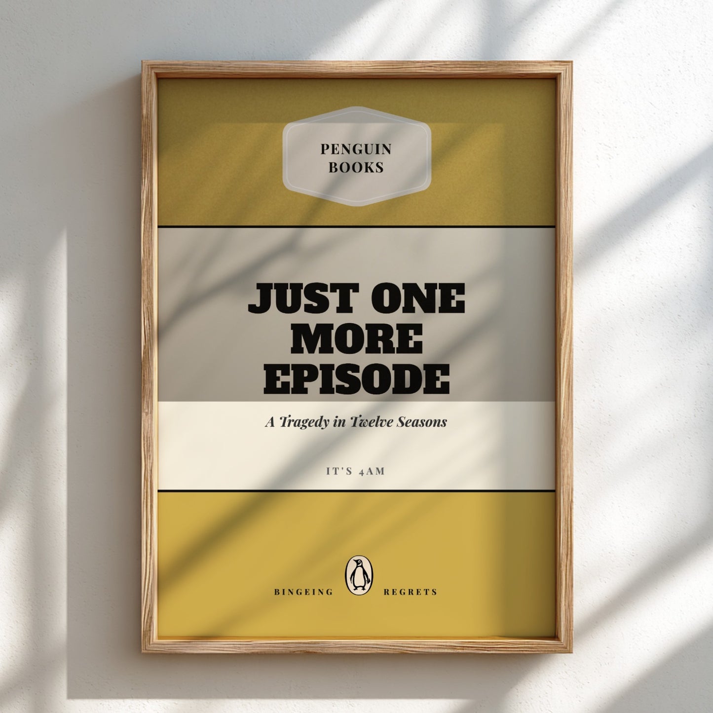 Framed book cover with 'Just One More Episode' text on a light background