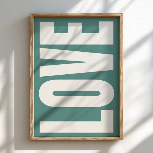 Framed artwork with the word 'LOVE' on a teal background