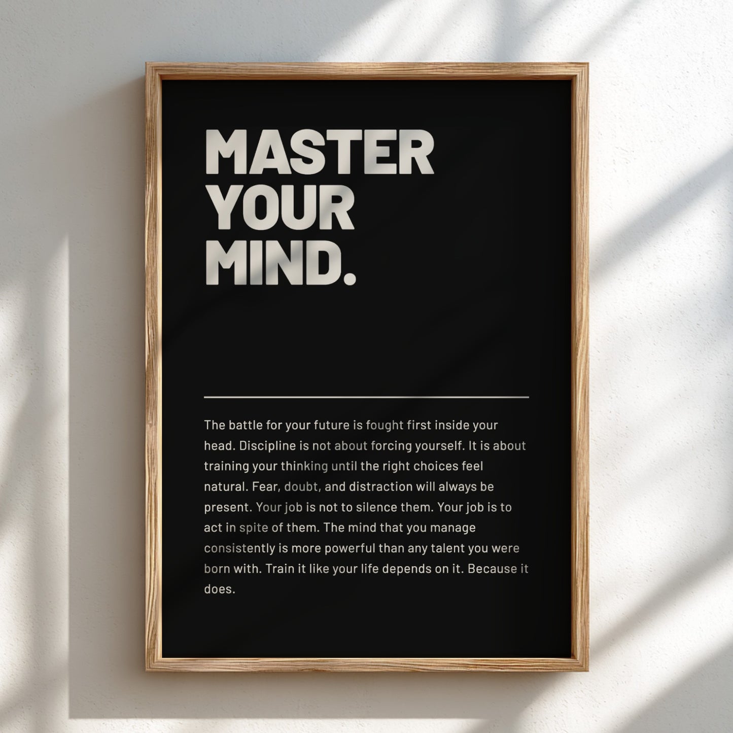 Framed poster with motivational quote 'Master Your Mind' on a black background