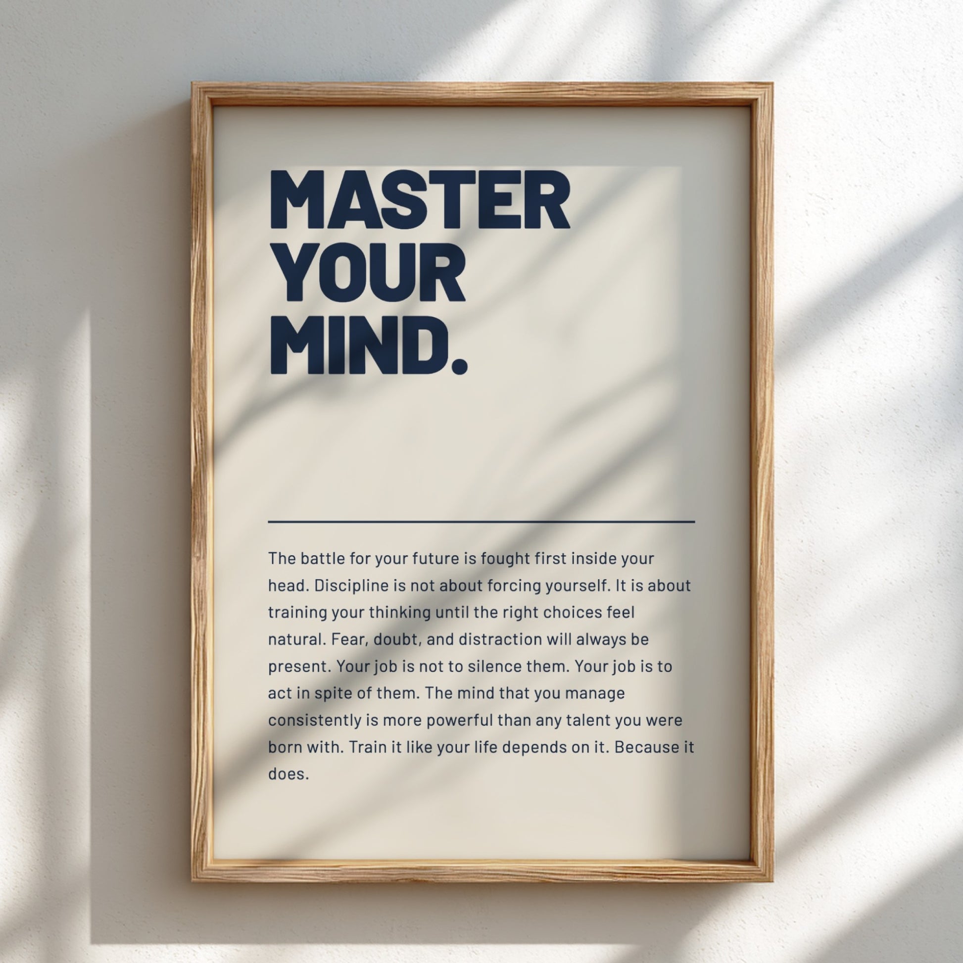 Framed poster with motivational quote 'Master Your Mind' on a light background