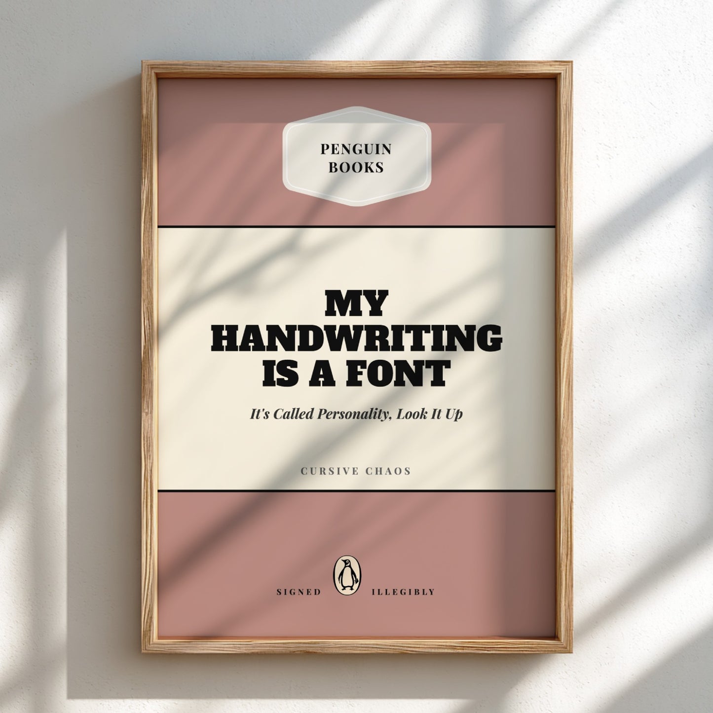 Framed poster with 'My Handwriting is a Font' quote on a pink and beige background