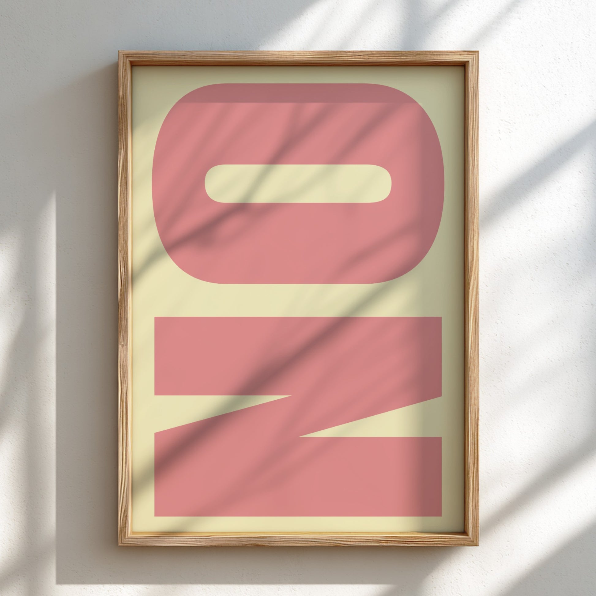 Framed artwork with abstract design on a light background
