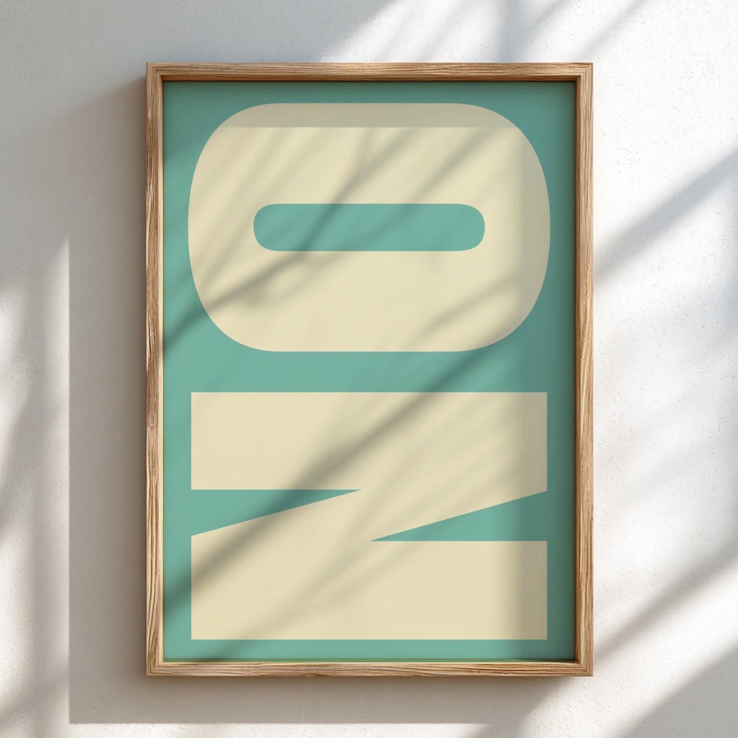 Framed artwork with the word 'ONE' on a teal background