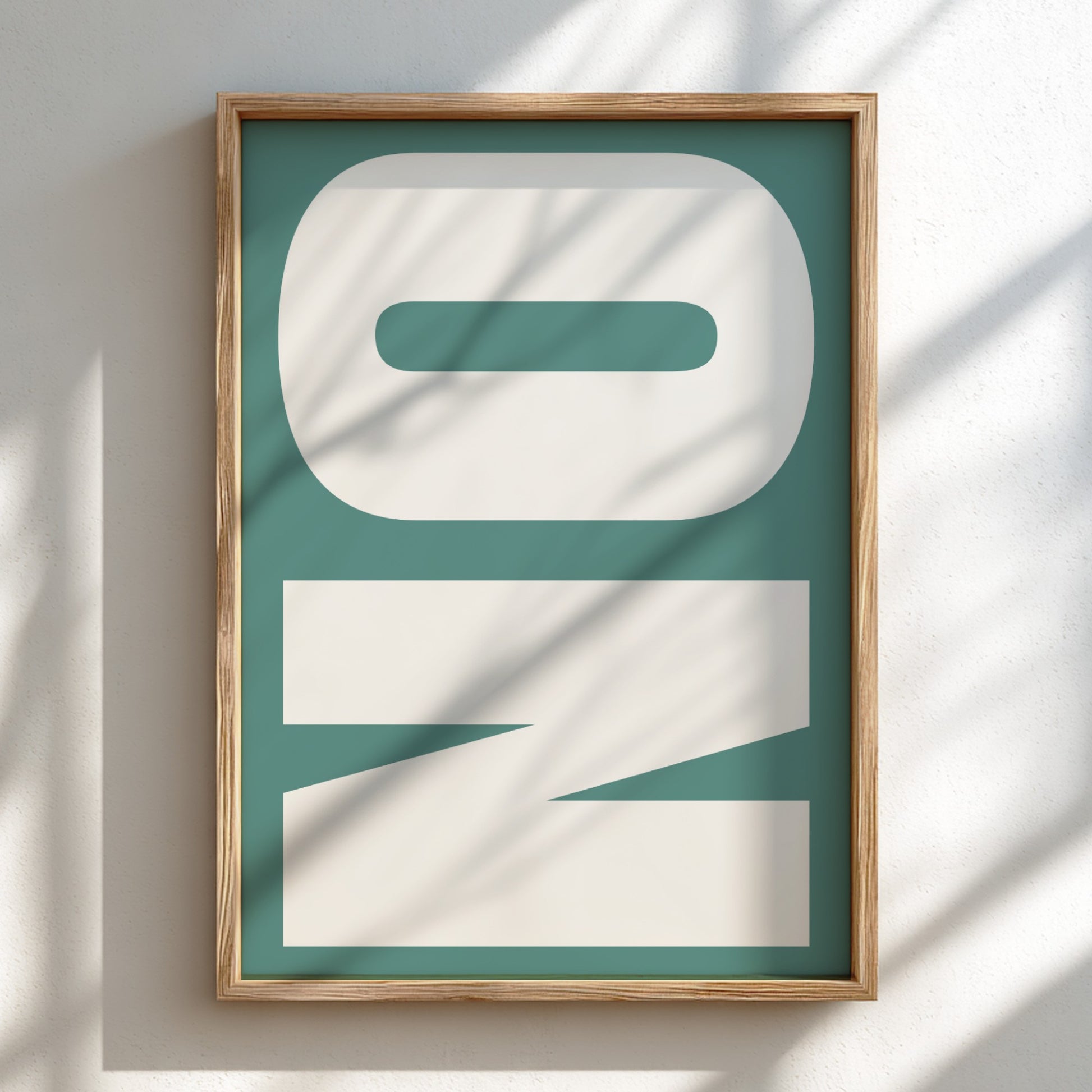 Framed artwork with abstract design on a light background