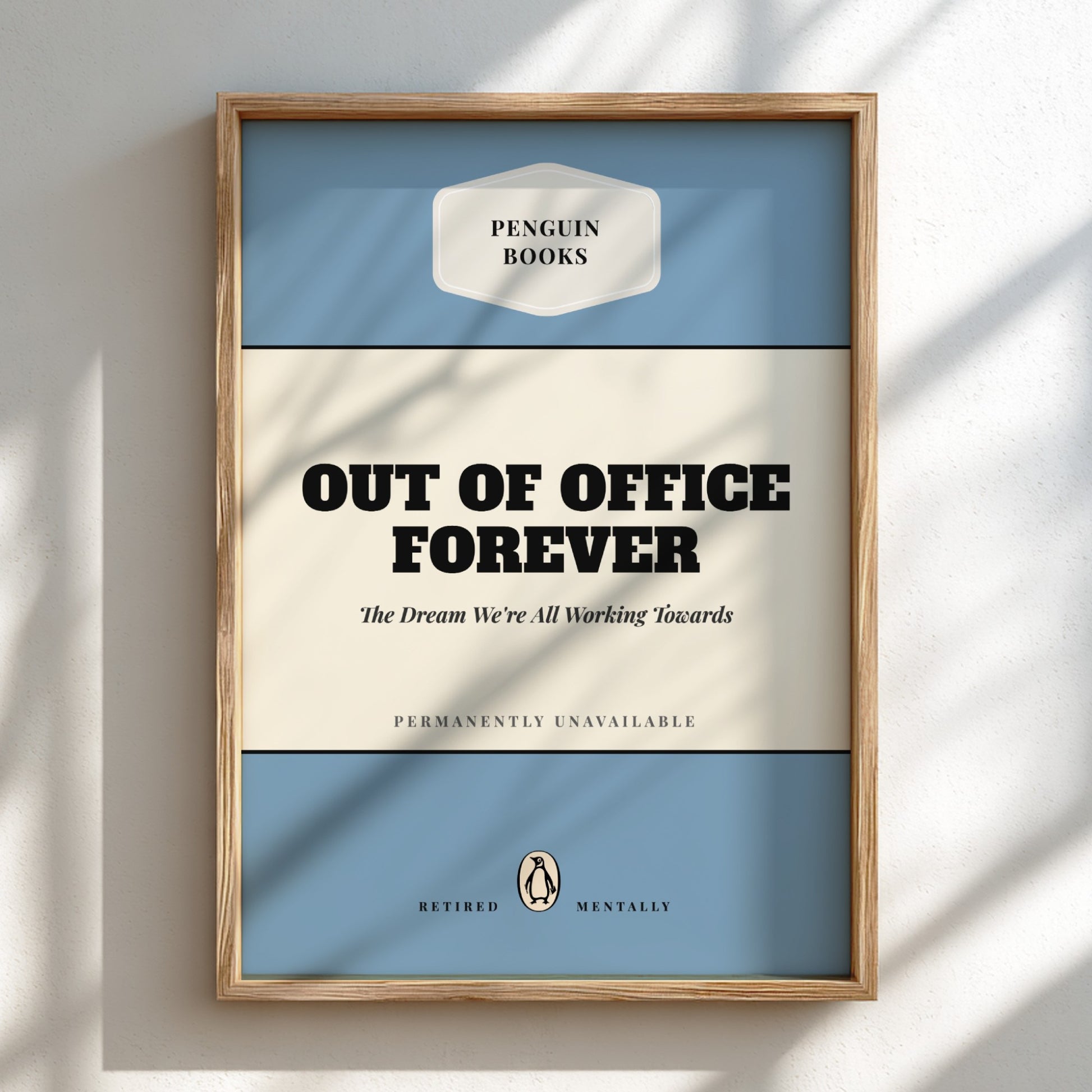 Framed poster with 'Penguin Books' design and text 'Out of Office Forever' on a light background.